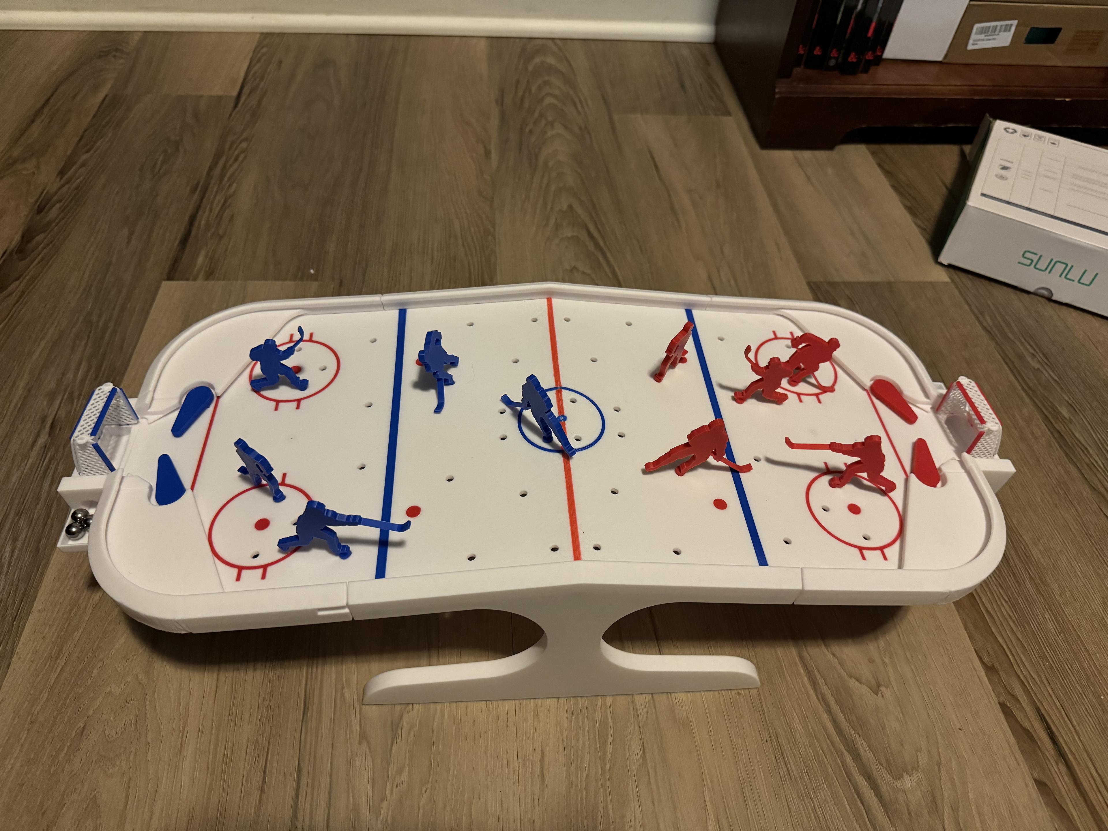 Desktop Hockey - Works great! May have to reprint the red flipper as one of them is sticking for some reason, but all the rest work great!  Probably will super glue the nets in too, as they get knocked out pretty easily.   - 3d model
