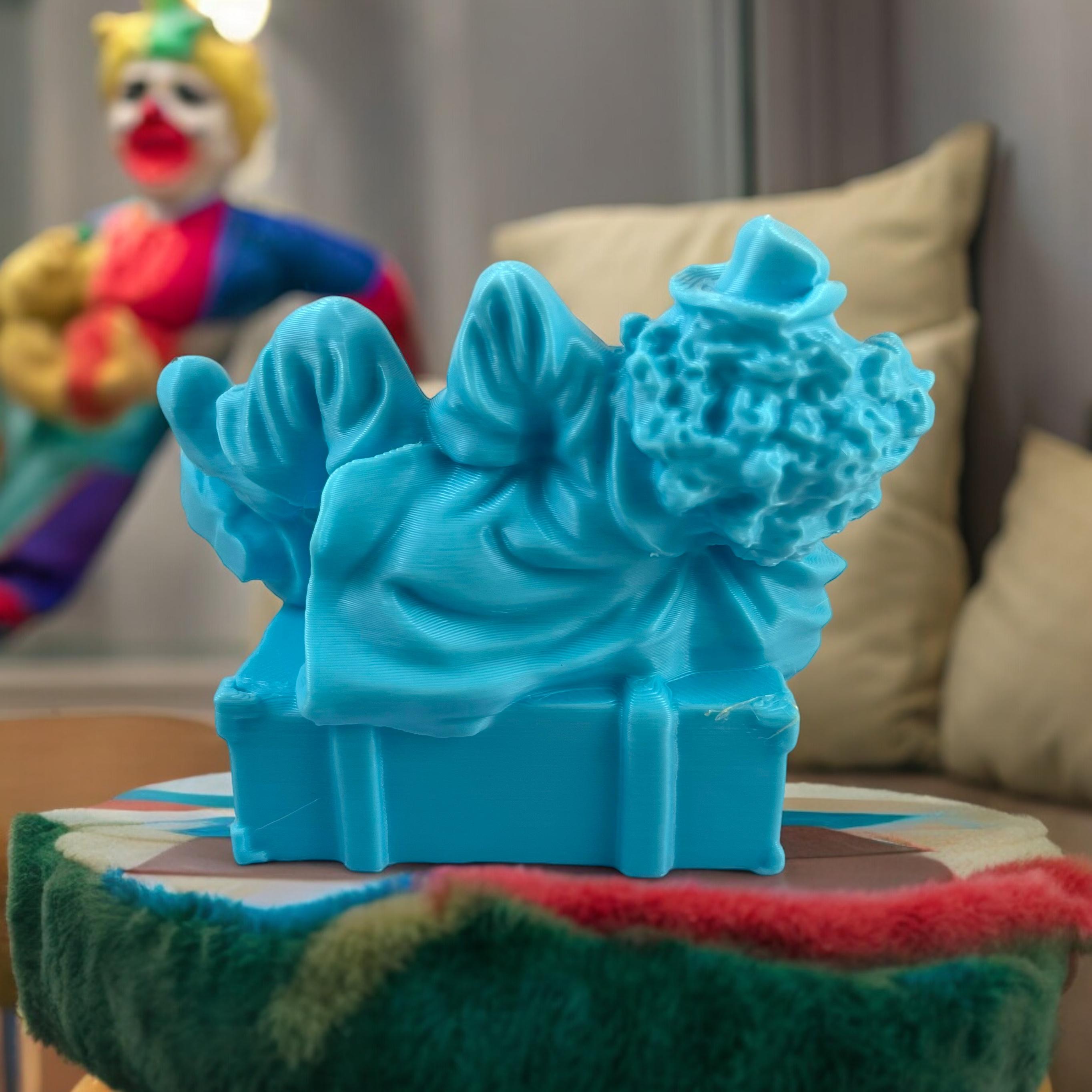 Clown lying on a suitcase 3d model