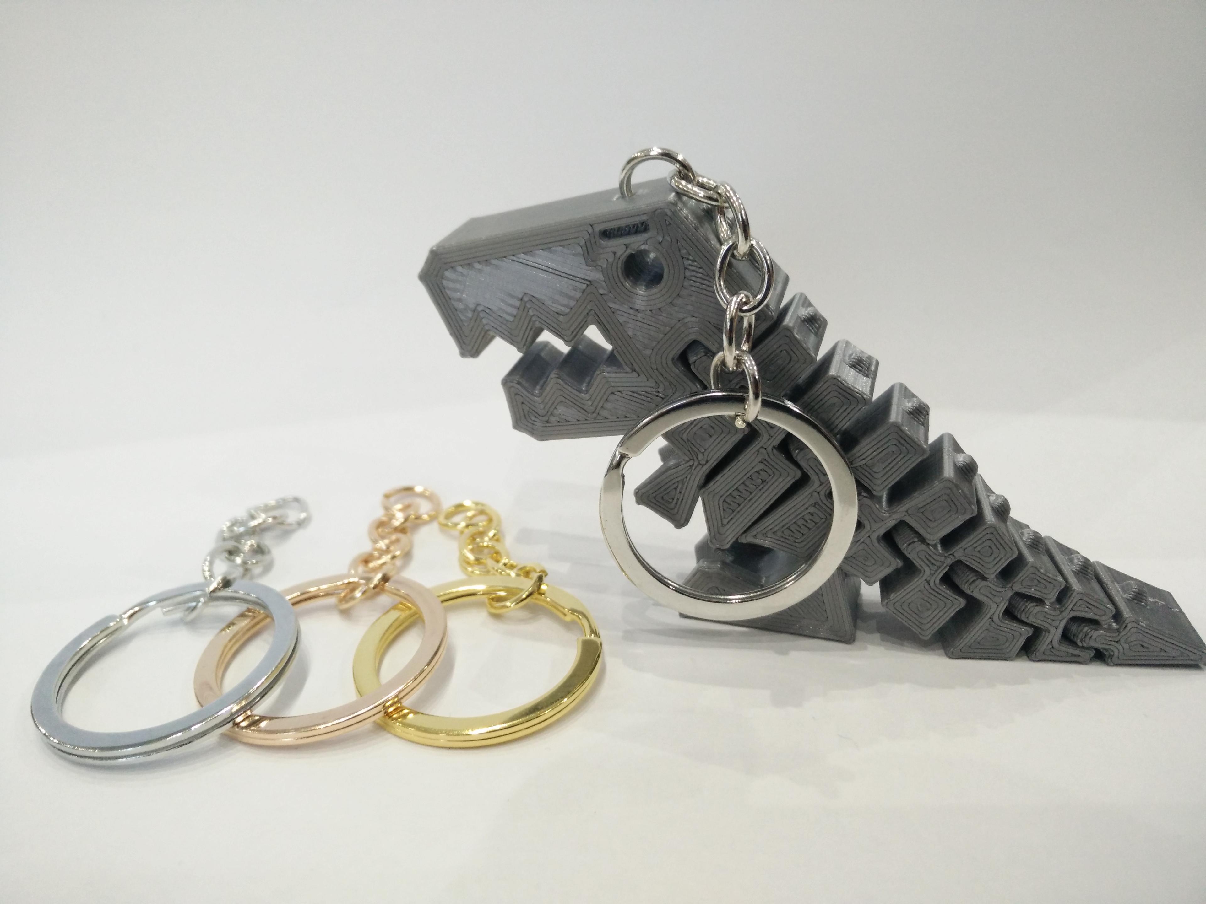 Flexi Rex Keychain with a hidden loop 3d model