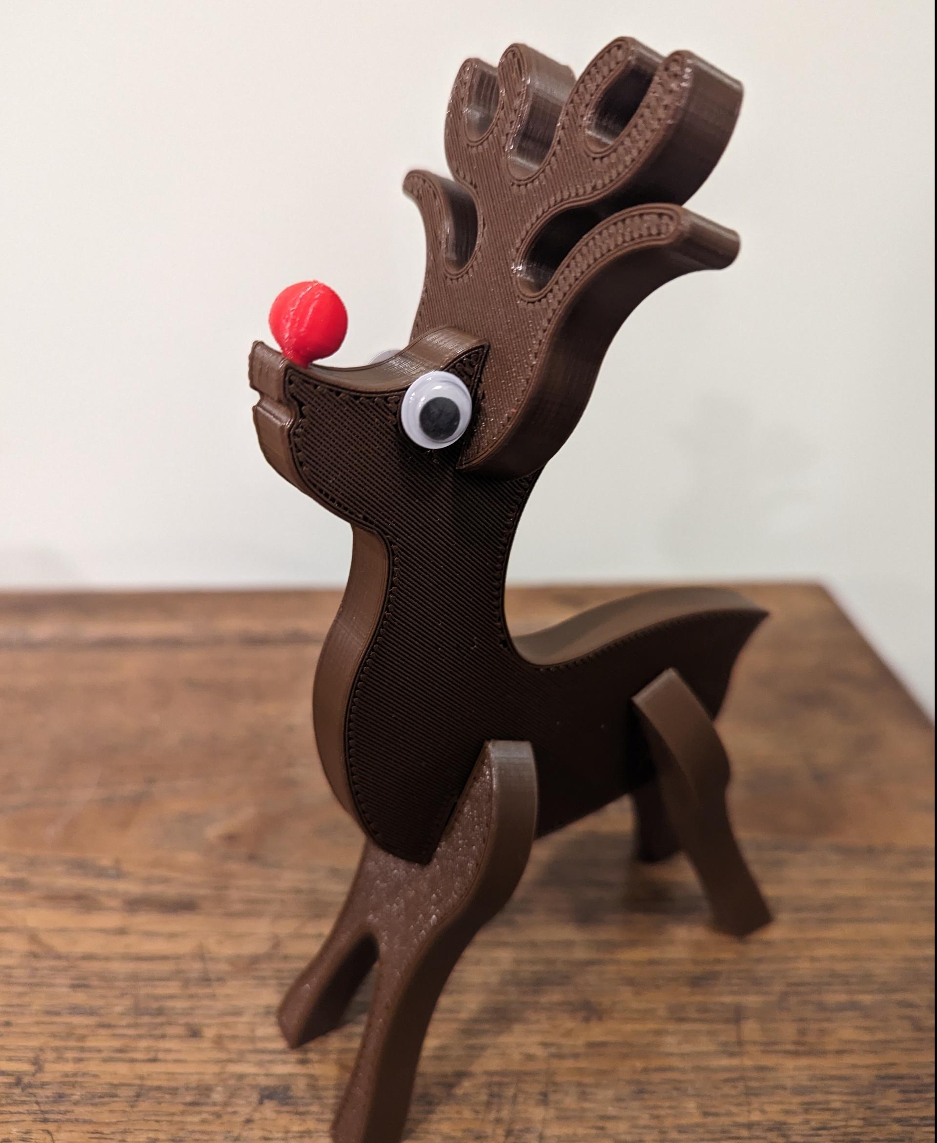 Reindeer Wood Cut Kit - @PrintedSolid Tree Brown
@GizmoDorks White
@prusament Lipstick Red

and googly eyes - 3d model