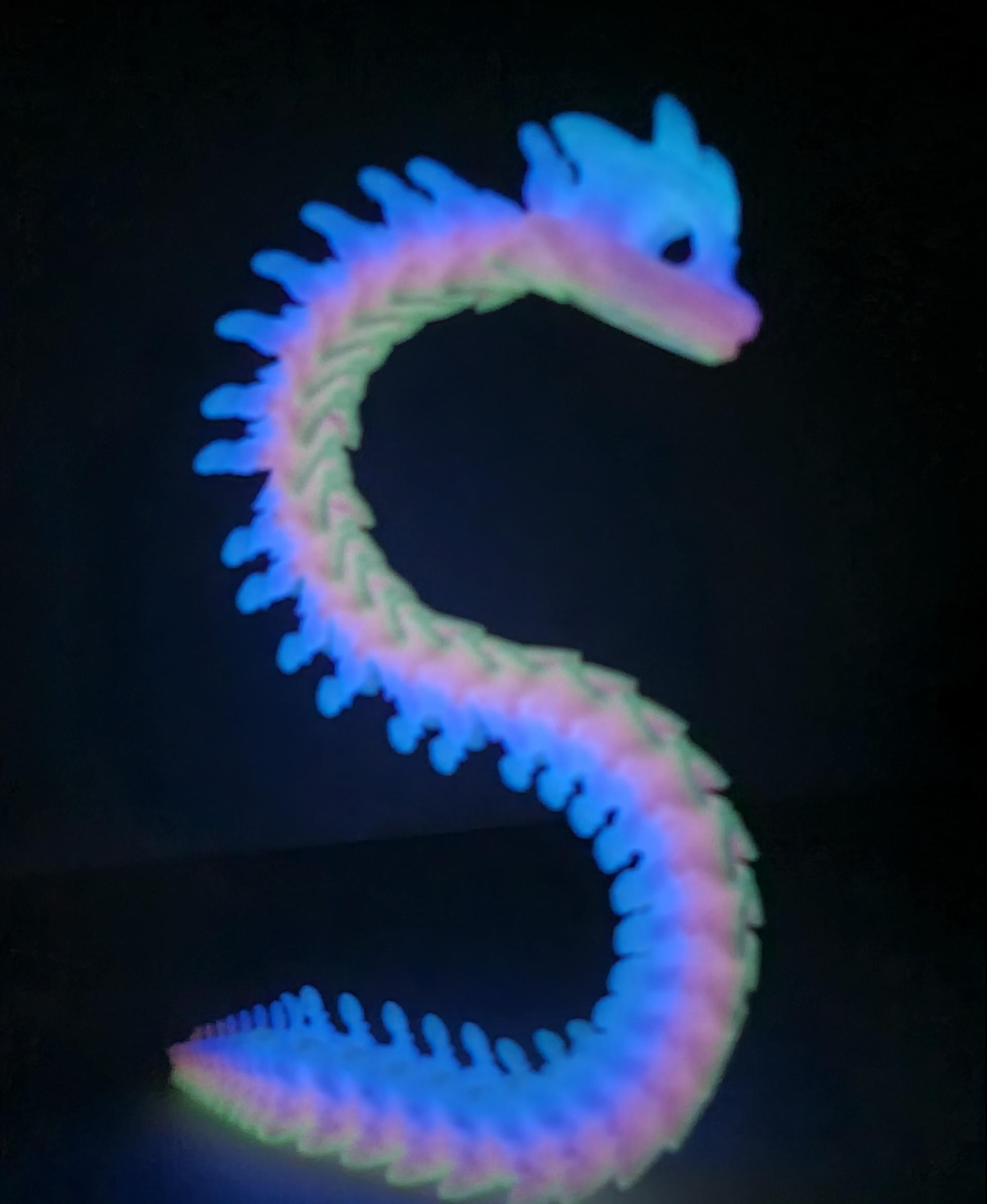 Extra Long Bony Basilisk - Articulated Snap-Flex Fidget (Loose Joints) - Printed using Giantarm Glow In The Dark Rainbow PLA. - 3d model