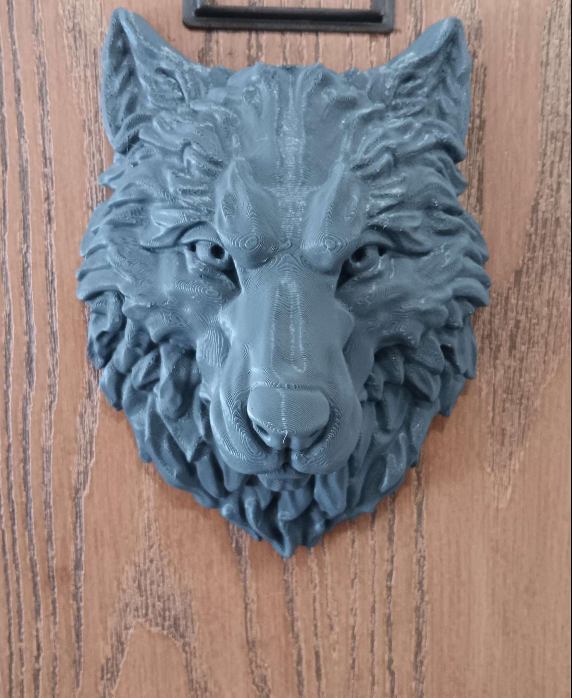Wolf  - Printed in Sliceworx Engineers Gray. I put it on my apartment door. No amazon can put my orders in the right spot lol.
 - 3d model