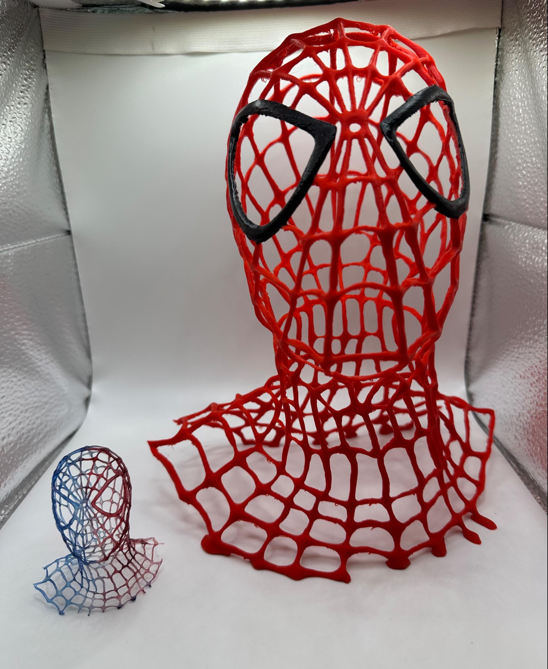 Venom Symbiotic Spider - Printed 2 ways. Resin and filament. Filament scaled up to 350%. Resin I believe I scaled down to 25% and colored with alcohol inks.  - 3d model