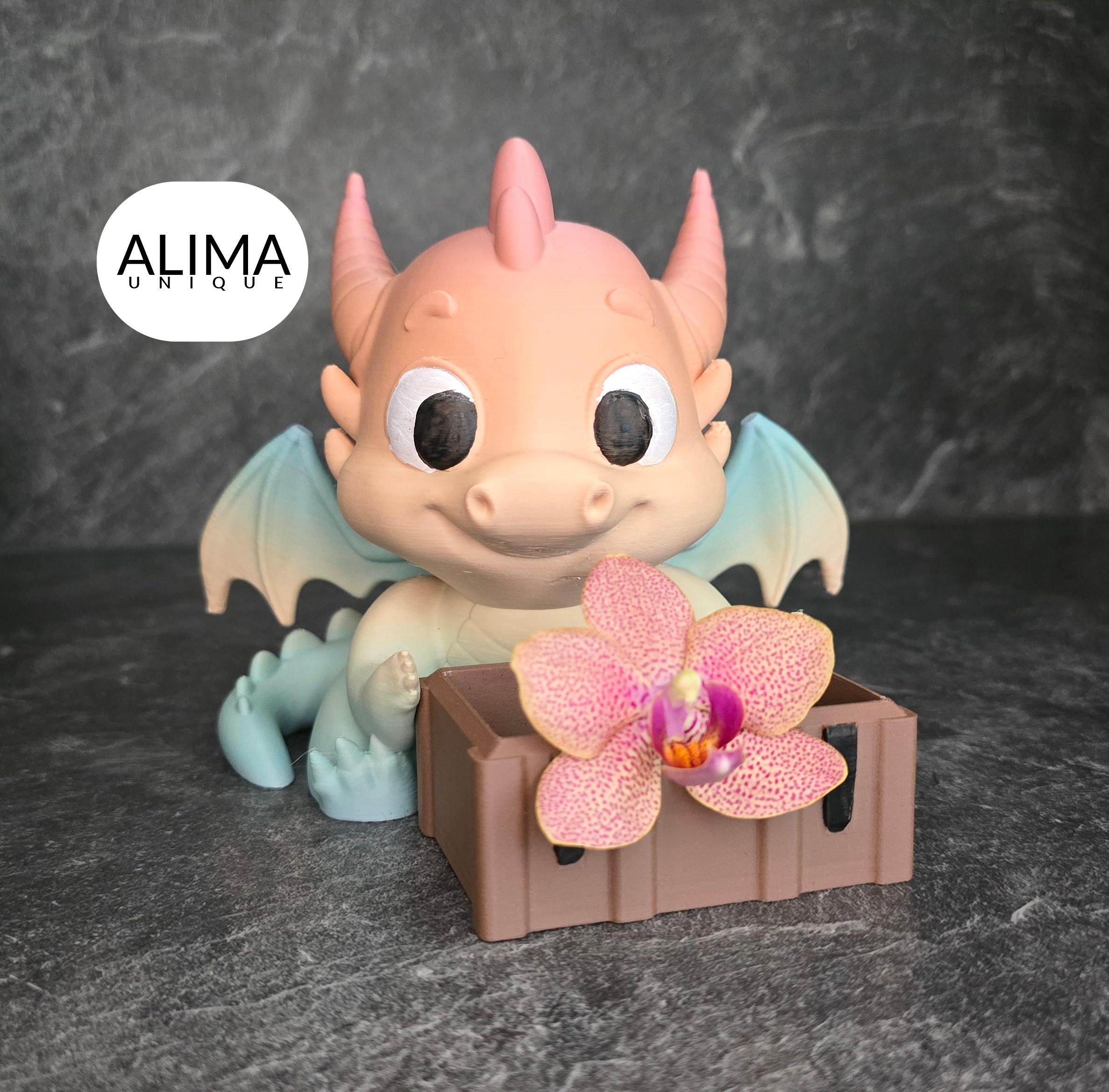 Baby dragon with a treasure chest 3d model