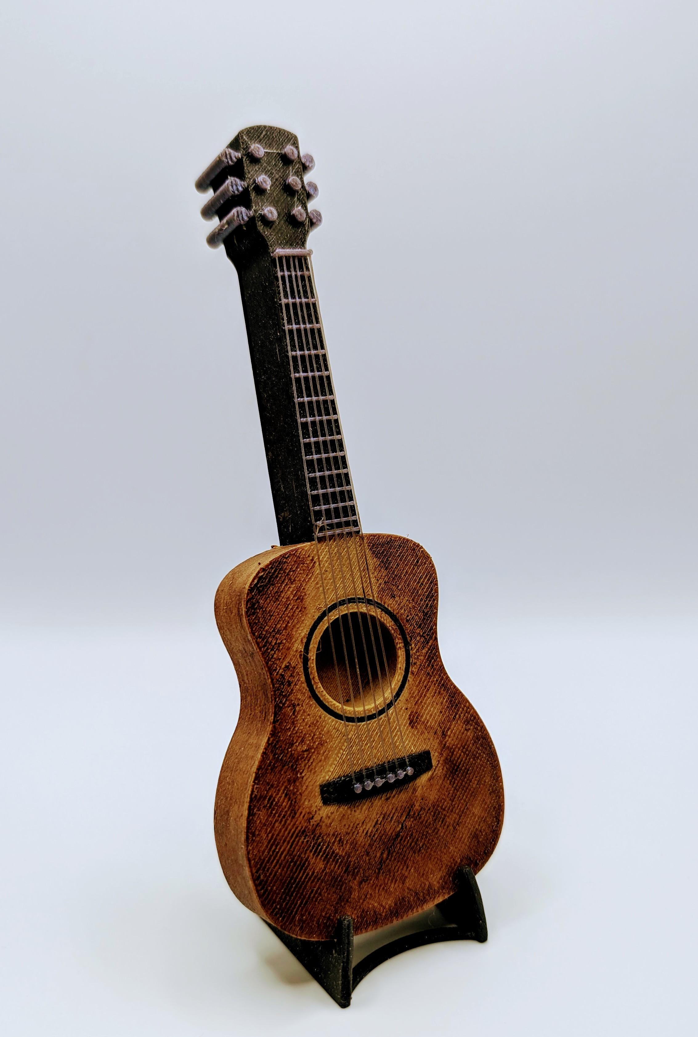 Tiny Guitar - Printed in Capricorn Heartwood PLA and gel stained for the distressed look - 3d model