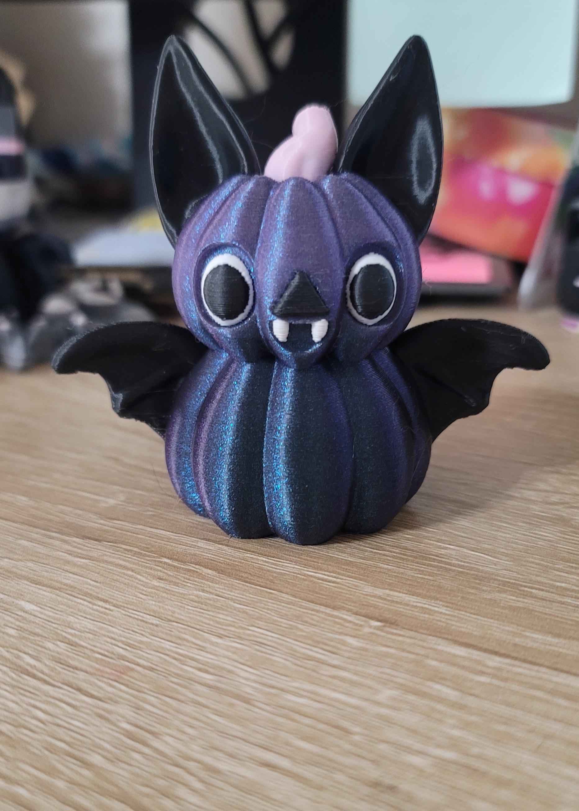 Pumpkin Bat  - I sized down to about 50% I believe (too impatient to wait for 100%) and used a blue/purple gradient cause I hate orange 🤷‍♀️🤣 regardless, it printed spooktacularly and I love him 🖤 - 3d model