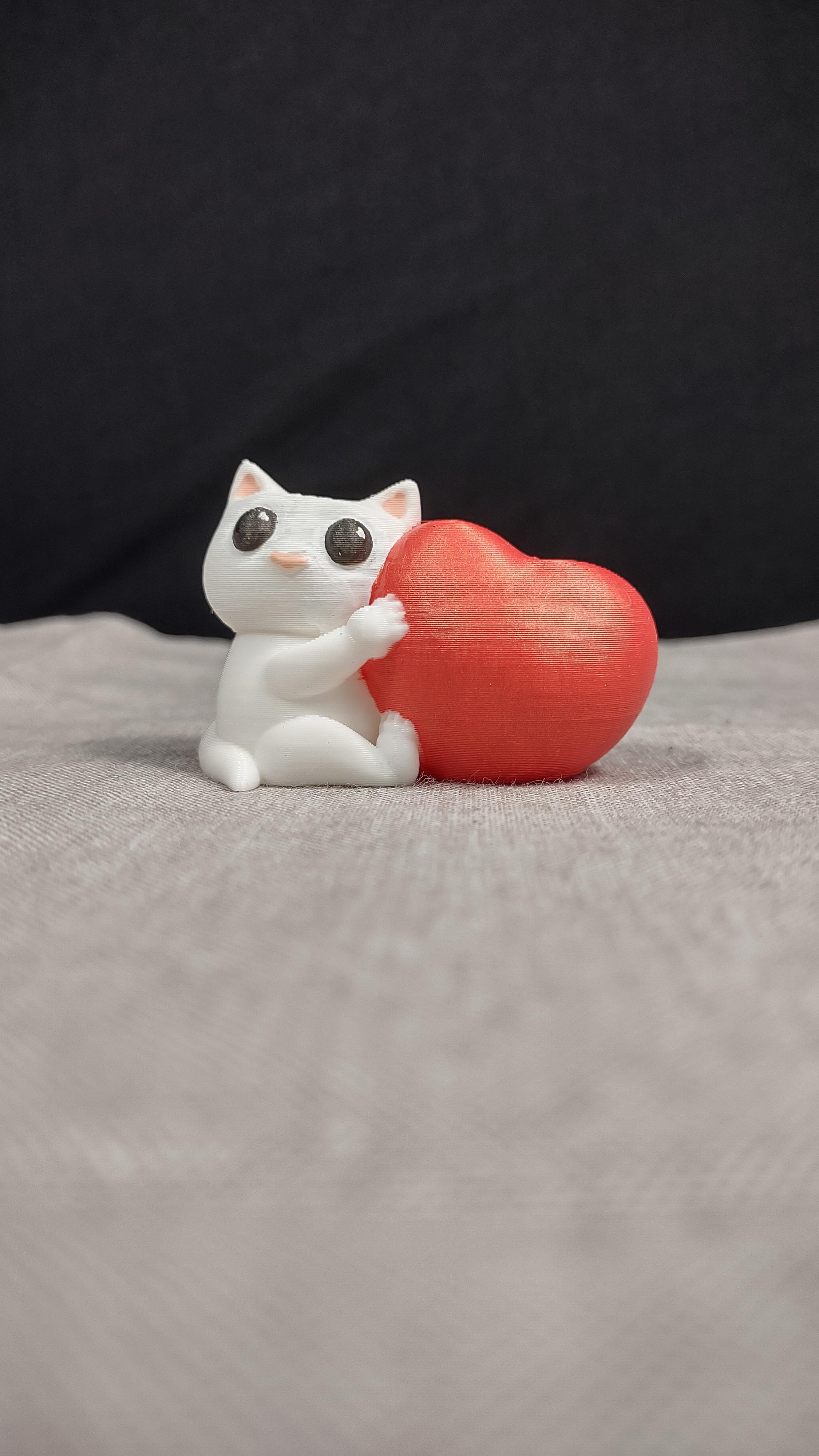 Cat Hugging a Heart 3d model