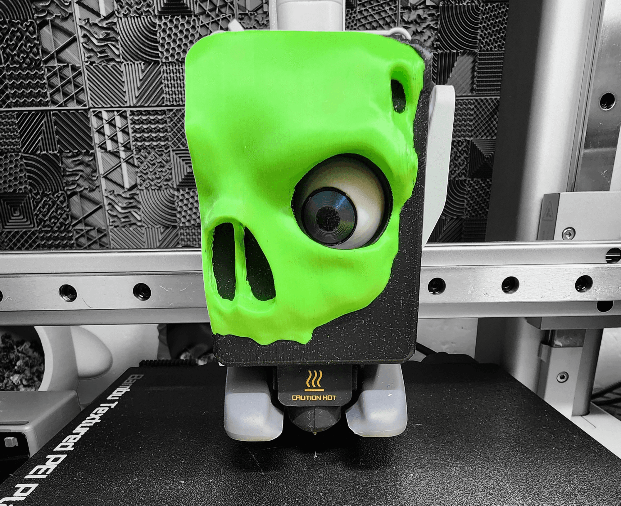 Skull Extruder Front Cover for the Bambu Labs A1 and A1 Mini  - Polymaker Pop Green ASA and Polymaker Galaxy Black ASA - 3d model