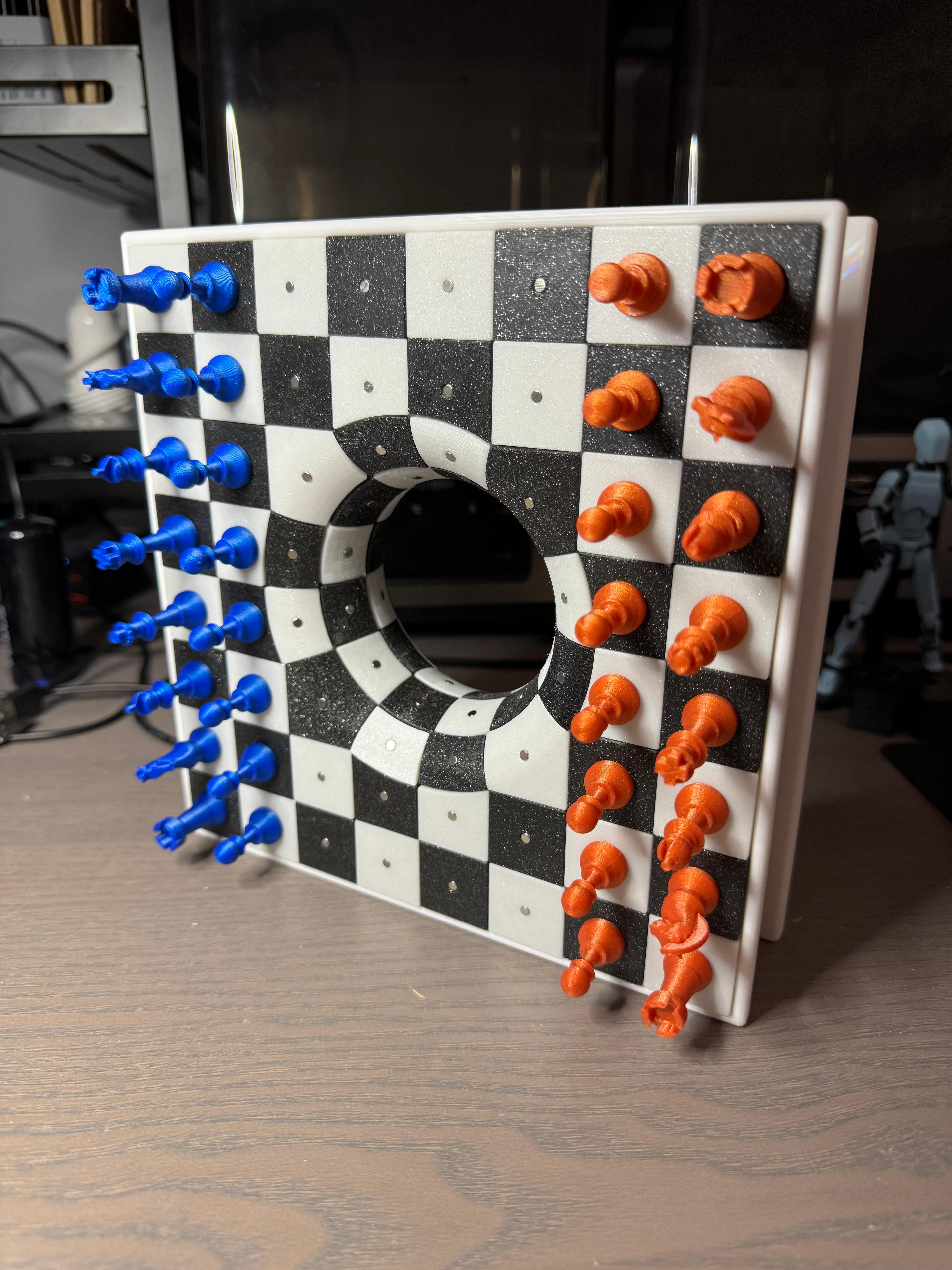 Wormhole Chess Board  - I don't play chess, but a friend of mine does. I printed this for them and can't wait to give it to them. I did have to print the 2 boards and 2 sets of the black squares because I glued it all together without realizing that the magnets should all have the same polarity facing the same way. Overall, it did print perfectly and I was happy with it. - 3d model