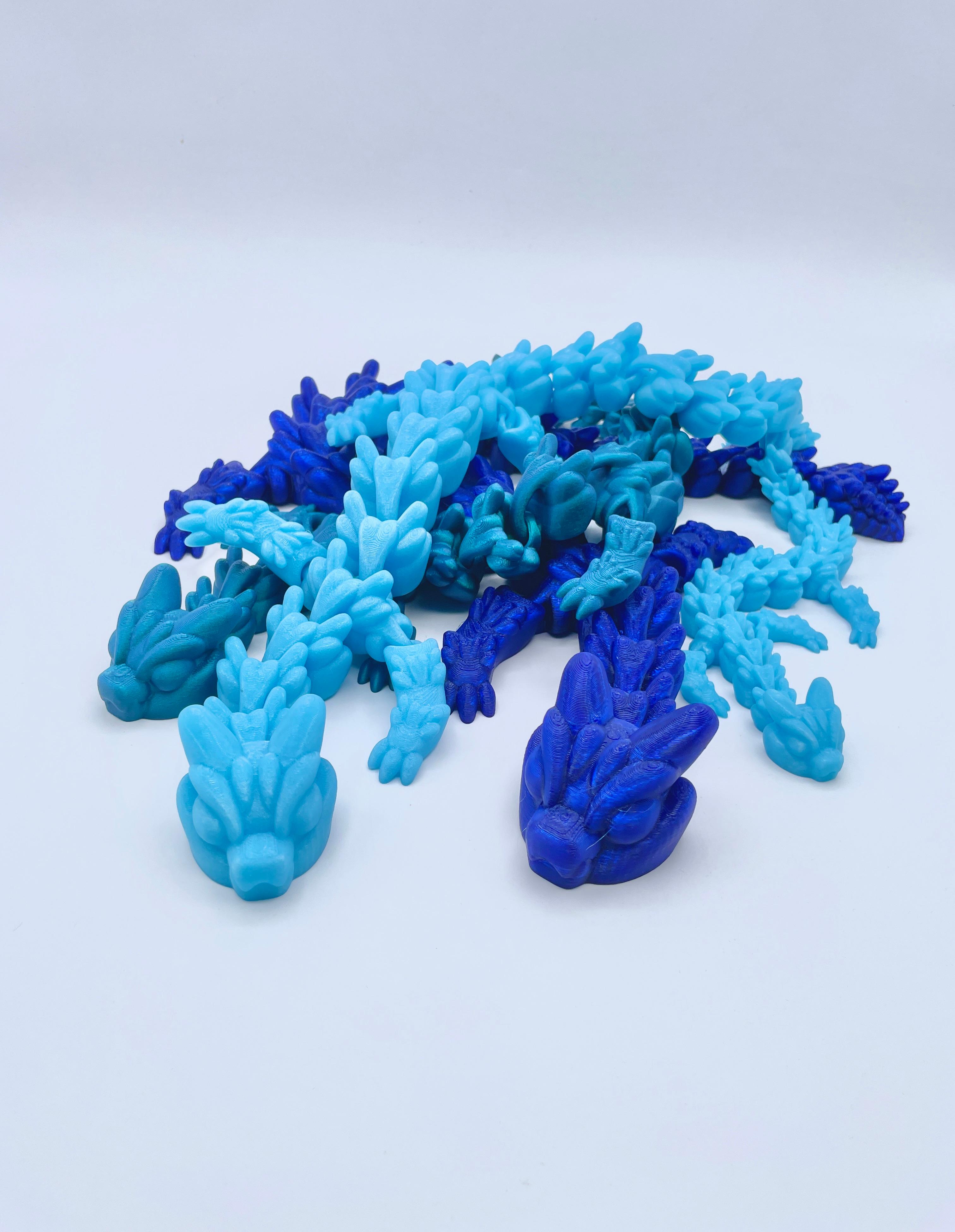 ArticulatedDragon - Aquamarine Dragon - Polymaker Panchroma Luminous Blue, Starlight Twilight and Translucent Blue PETG - 3d model