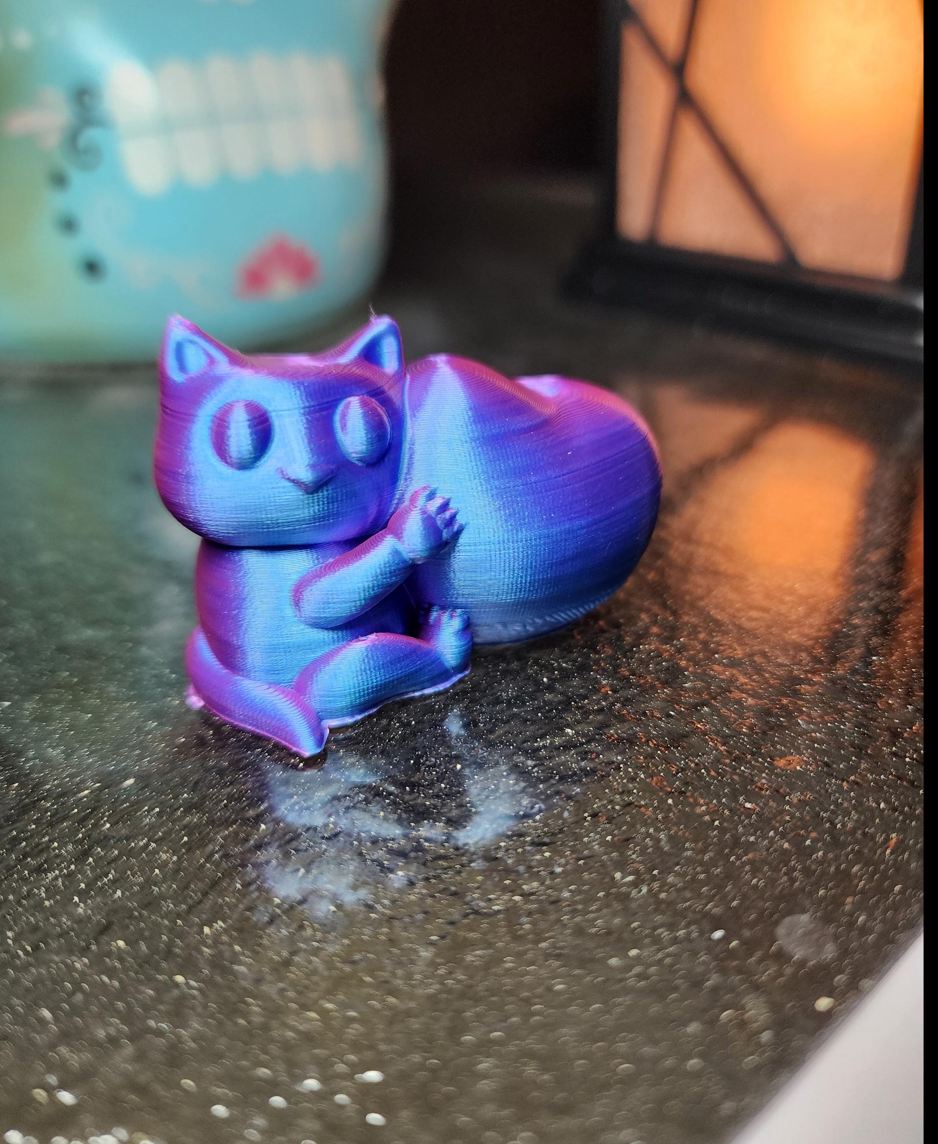 Cat Hugging a Heart 3d model