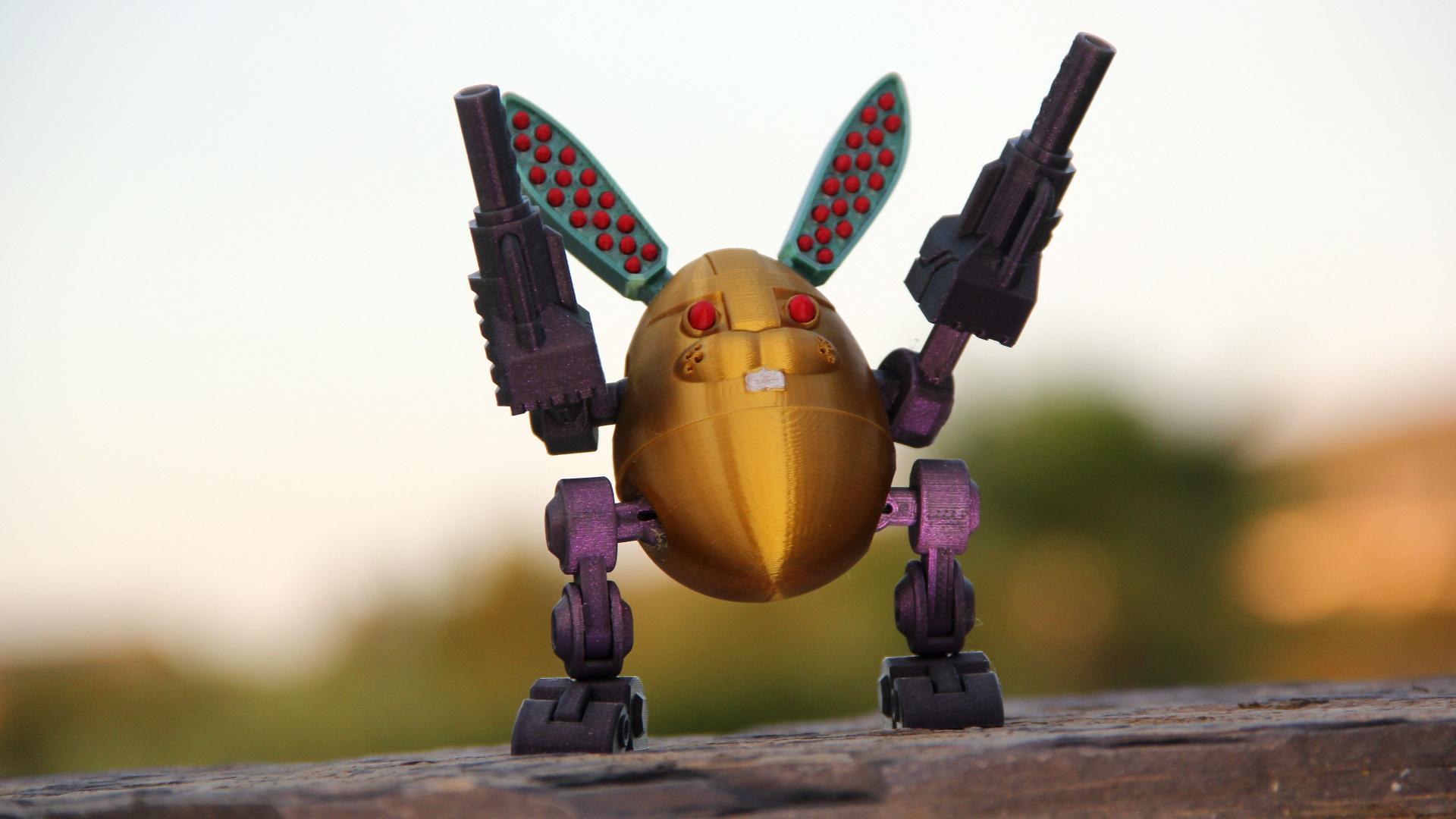 Articulated Easter Bot — 3GG-8UNNY - Easterbunny bot on top of the world, printed in Polymaker PolyLite Silk Gold, Dual Silk Jadeite, Starlight Nebula - 3d model