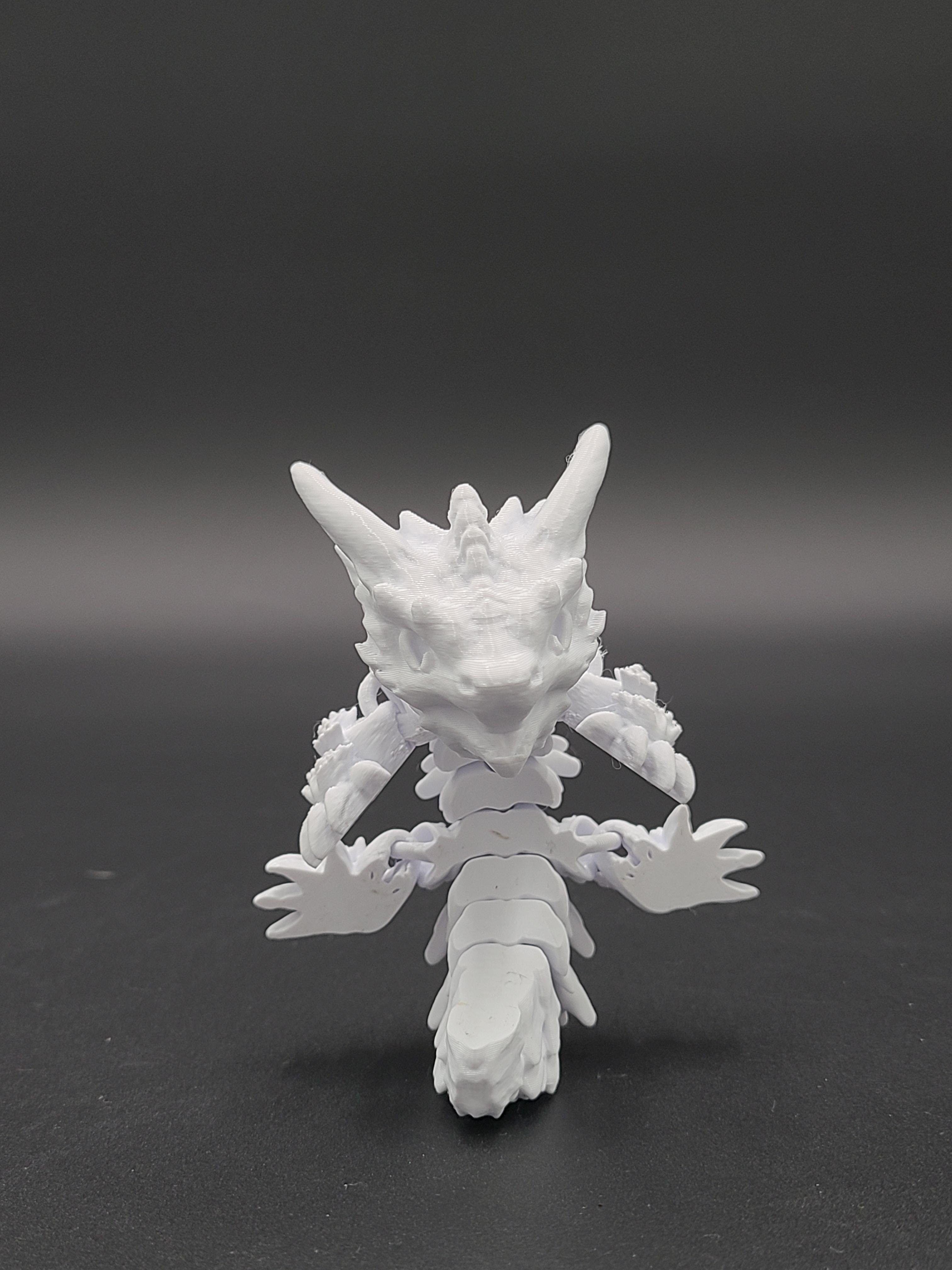 Frostbite, Winter Dragon Child - Articulated Snap-Flex Fidget (Loose Joints) 3d model