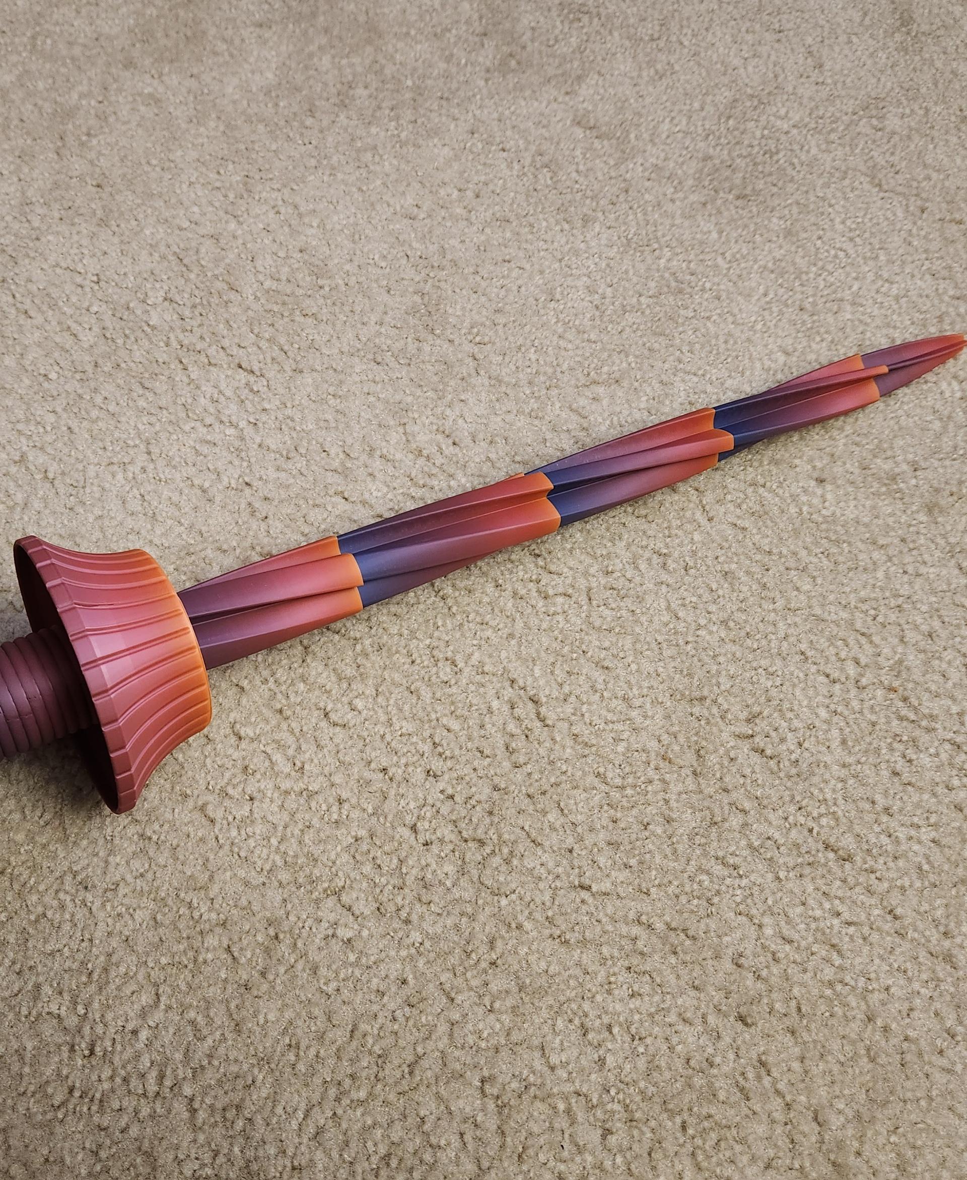 Collapsing Drill Sword Print - Creality rainbow filament on Bambu Lab X1C - 3d model