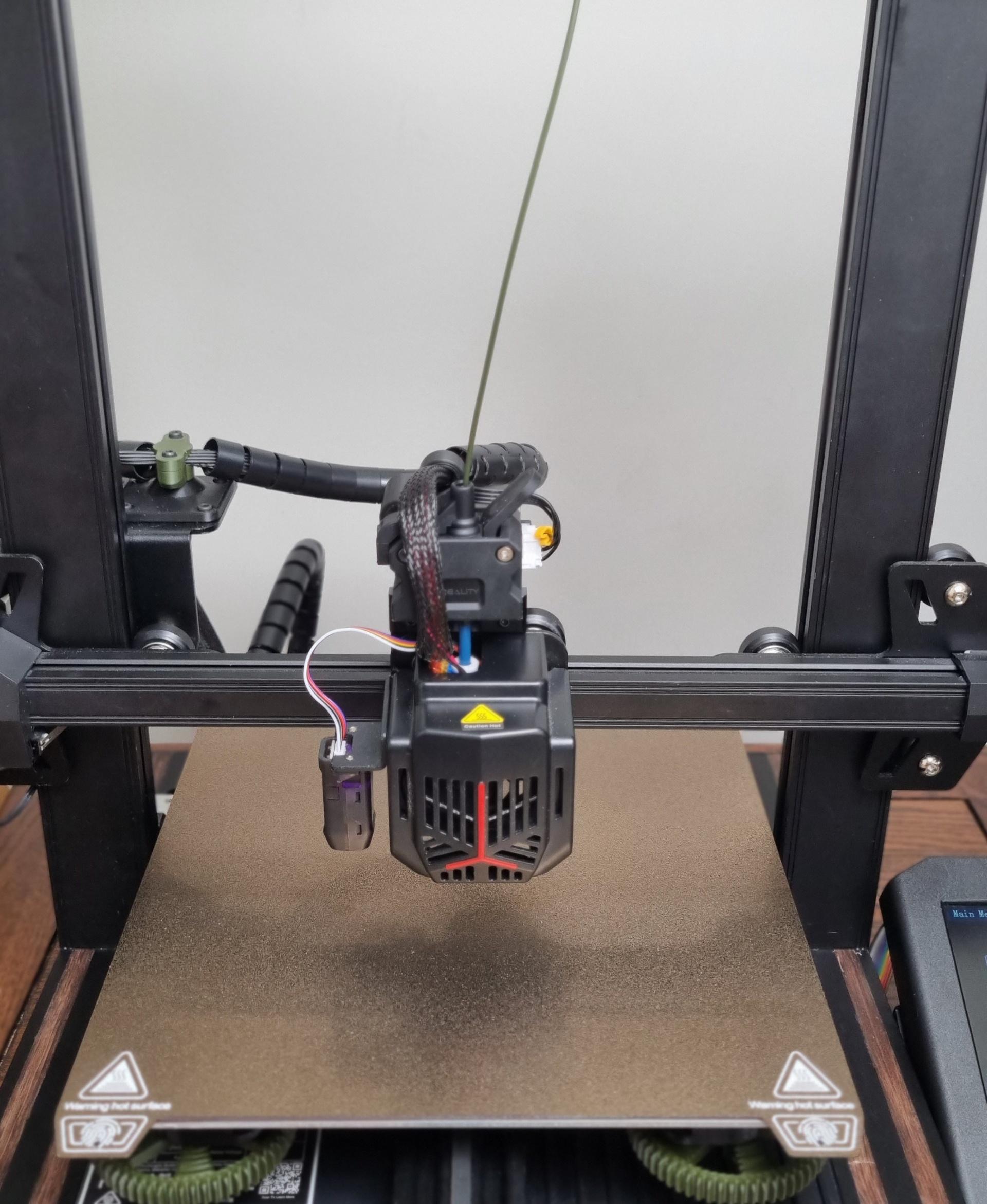 Hotend Cable Guide for Direct Drive Ender 3 V2 & Other Creality 3D Printers - Really Love this Model - Not sure on my choice of cable tube tho (had it lying around). 

Used Mesh Mixer to chop up the STL to print in two colours. - 3d model