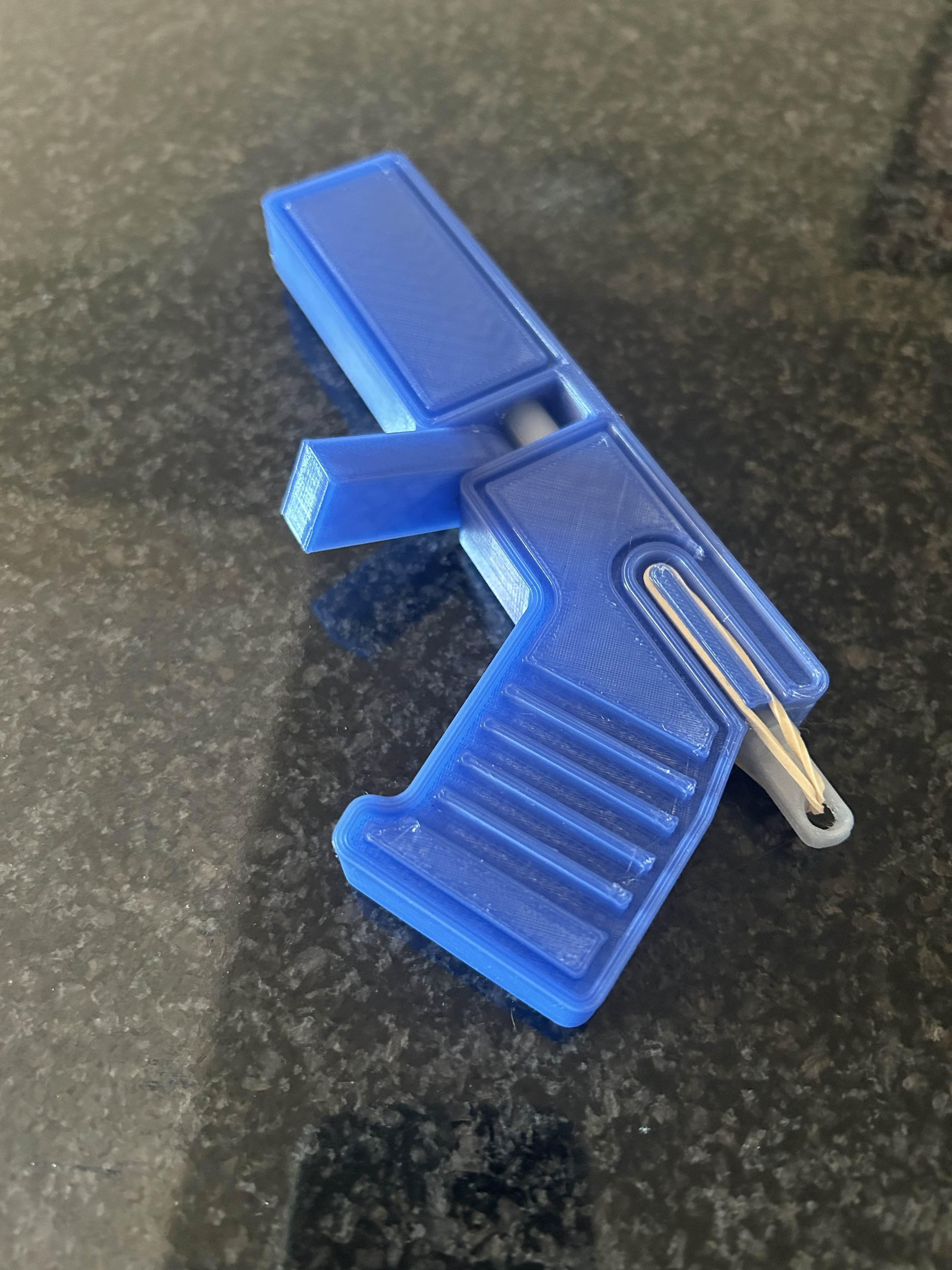 Print-in-Place Slip Launcher Toy 3d model