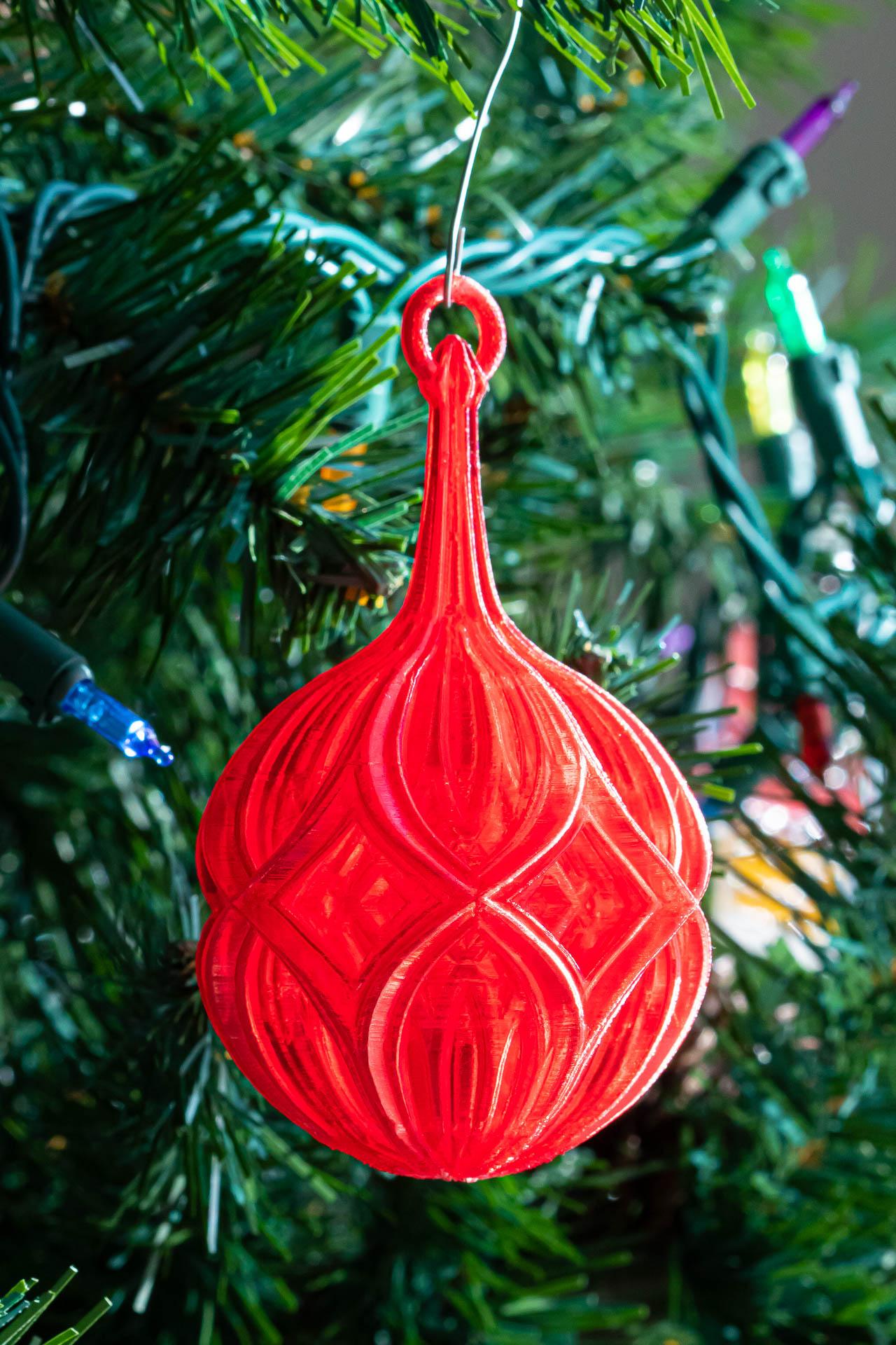 Diamond Christmas Ball - Matterhackers Translucent Red PLA lit by the morning sun. - 3d model