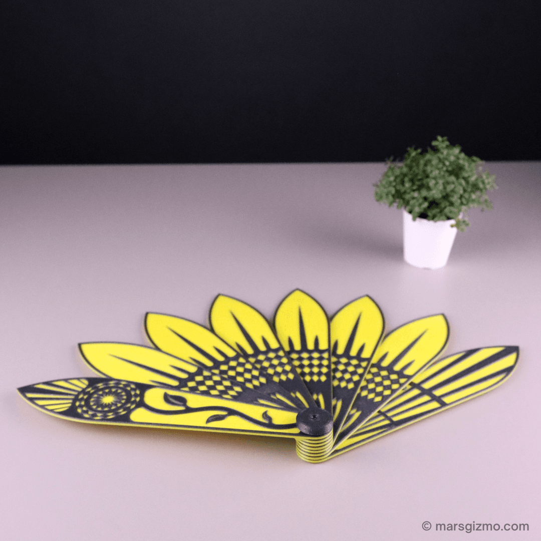 Sunflower Hand Fan (STL Format) | #pdo #summer | NoahMillerDesign - Check it in my video:
https://youtu.be/u1EImXgntHI

My website: https://www.marsgizmo.com - 3d model