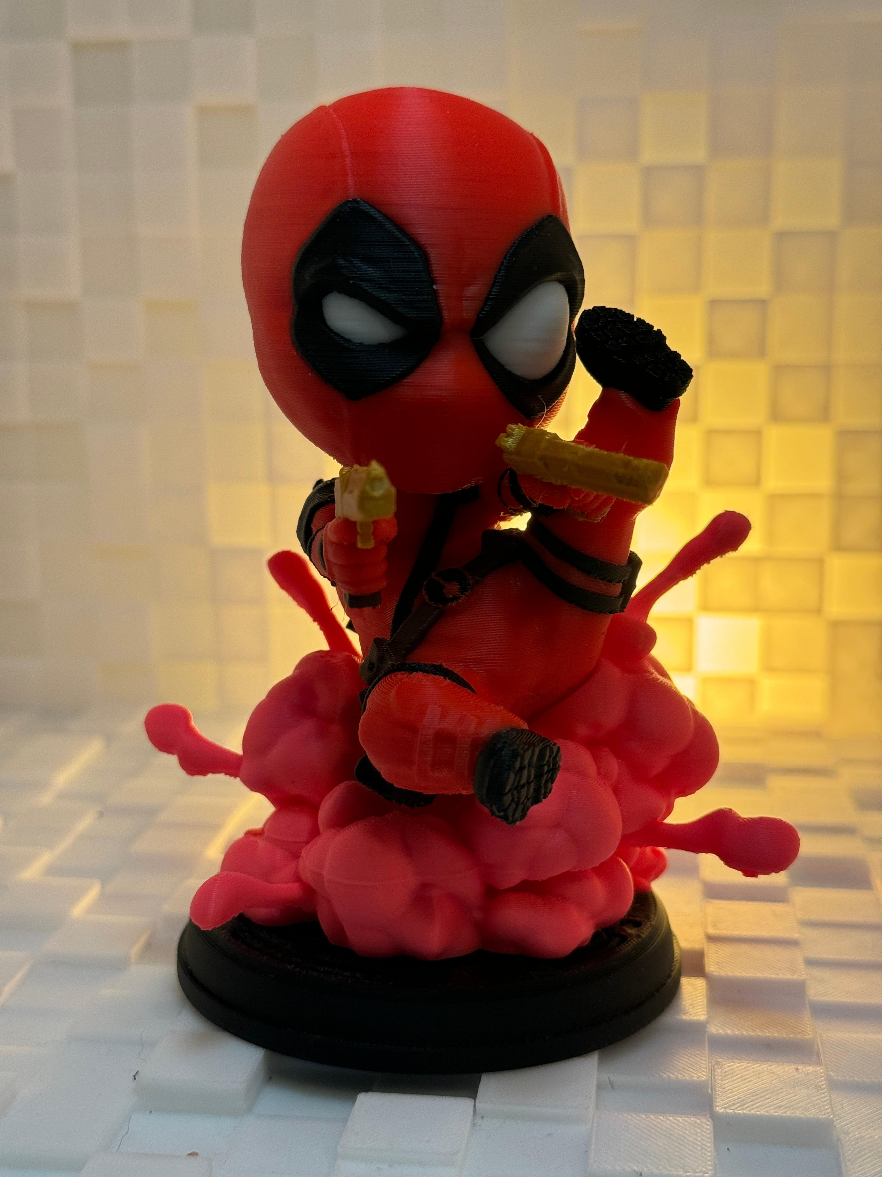 Li'l Deadpool - Multicolor - Collectable Fanart Figure - I had so much fun printing this model; it has got to be one of the best and most fun Deadpool models out there! I really love the say the designer split it in parts that can be independently painted and printed, and added magnets to each piece to make the parts interchangeable should you want to do them in different colors (like I did with the explosion)! I may print another version of this with Wolverine's colors just for the fun of it.

I spent a few hours painting these parts, which made the end result even more rewarding.

If you're a Deadpool fan, you have to get this one! - 3d model