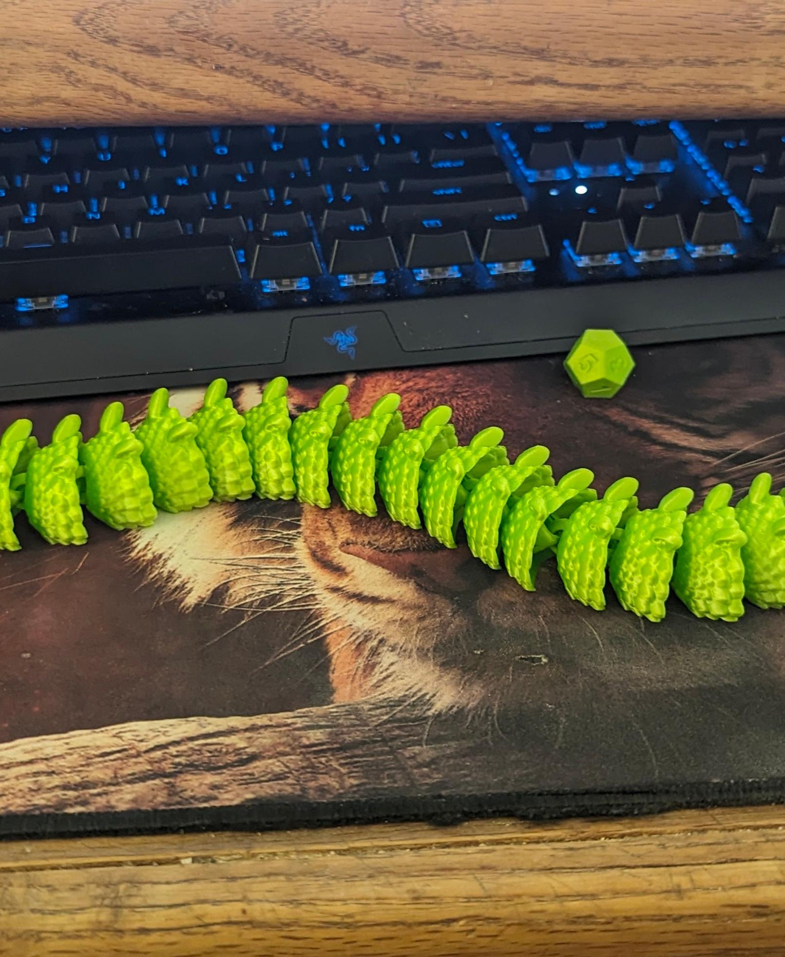 Baby Basilisk (Extra Long) - Articulated Snap-Flex Fidget (Medium Tightness Joints) - Long enough to fit across a full keyboard length. - 3d model