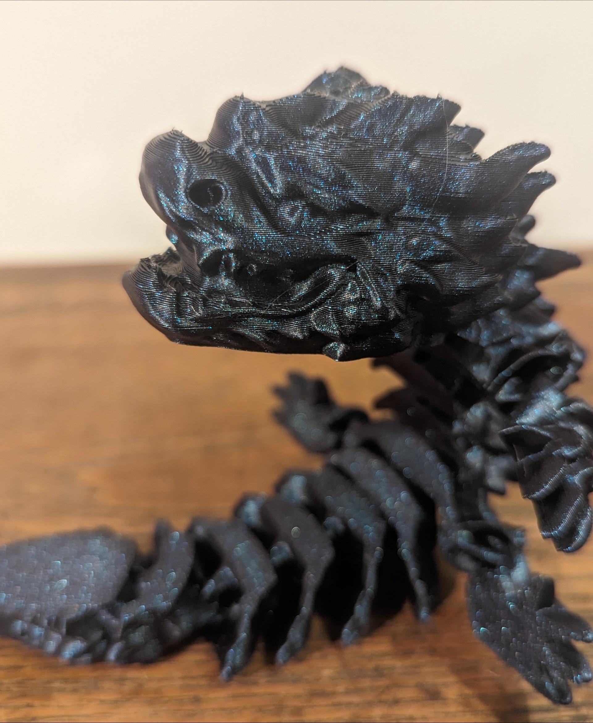 Snowfall, Winter Dragon Child - Articulated Dragon Snap-Flex Fidget (Medium Tightness Joints) - Snowfall printed on the KP3S in FlashForge
 Burnt Titanium - 3d model