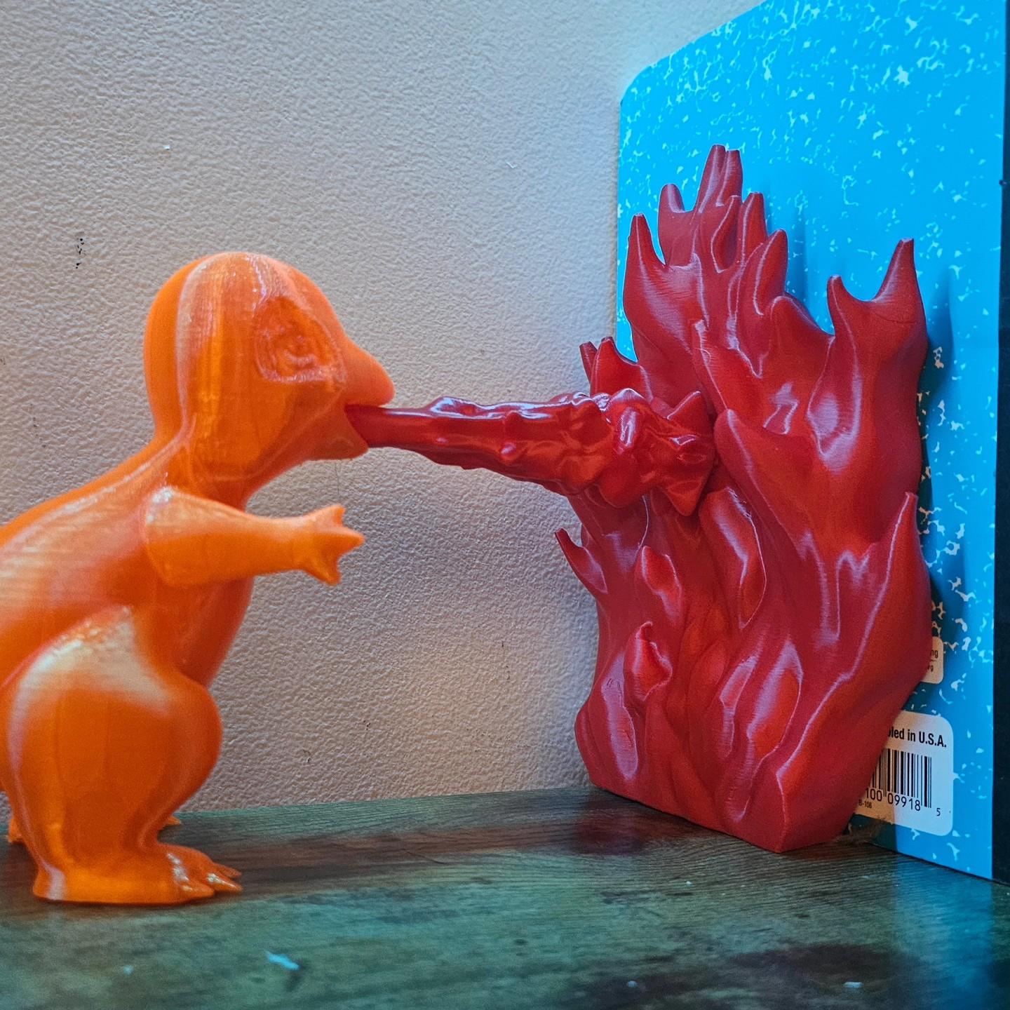 Charmander Bookend - Fiery 3D Print for Pokémon Lovers - Printed this Charmander Bookend in about 6 hours for each piece—the flames and Charmander. The print came out perfectly with minimal supports, making it an easy and satisfying project. If you're looking for a fun and functional design that’s quick to print, this one is a great choice! I’m thrilled with how it turned out.

Also this is how I arranged the Flames for printing

I did print Charmander in petG because I didn't have any Orange pla - 3d model