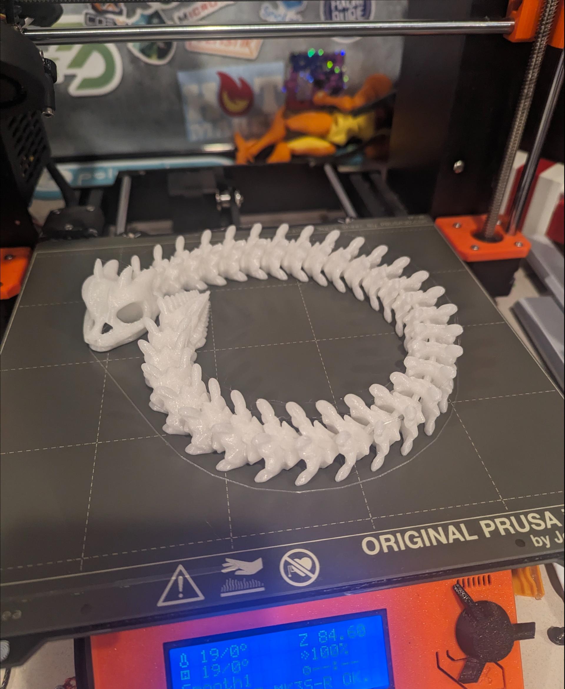 Extra Long Bony Basilisk - Articulated Snap-Flex Fidget (Medium Tightness Joints) - BonyBasilisk printed on the MK3S+ @zyltech
 Hunted Embor (Glow in the dark orange.) - 3d model