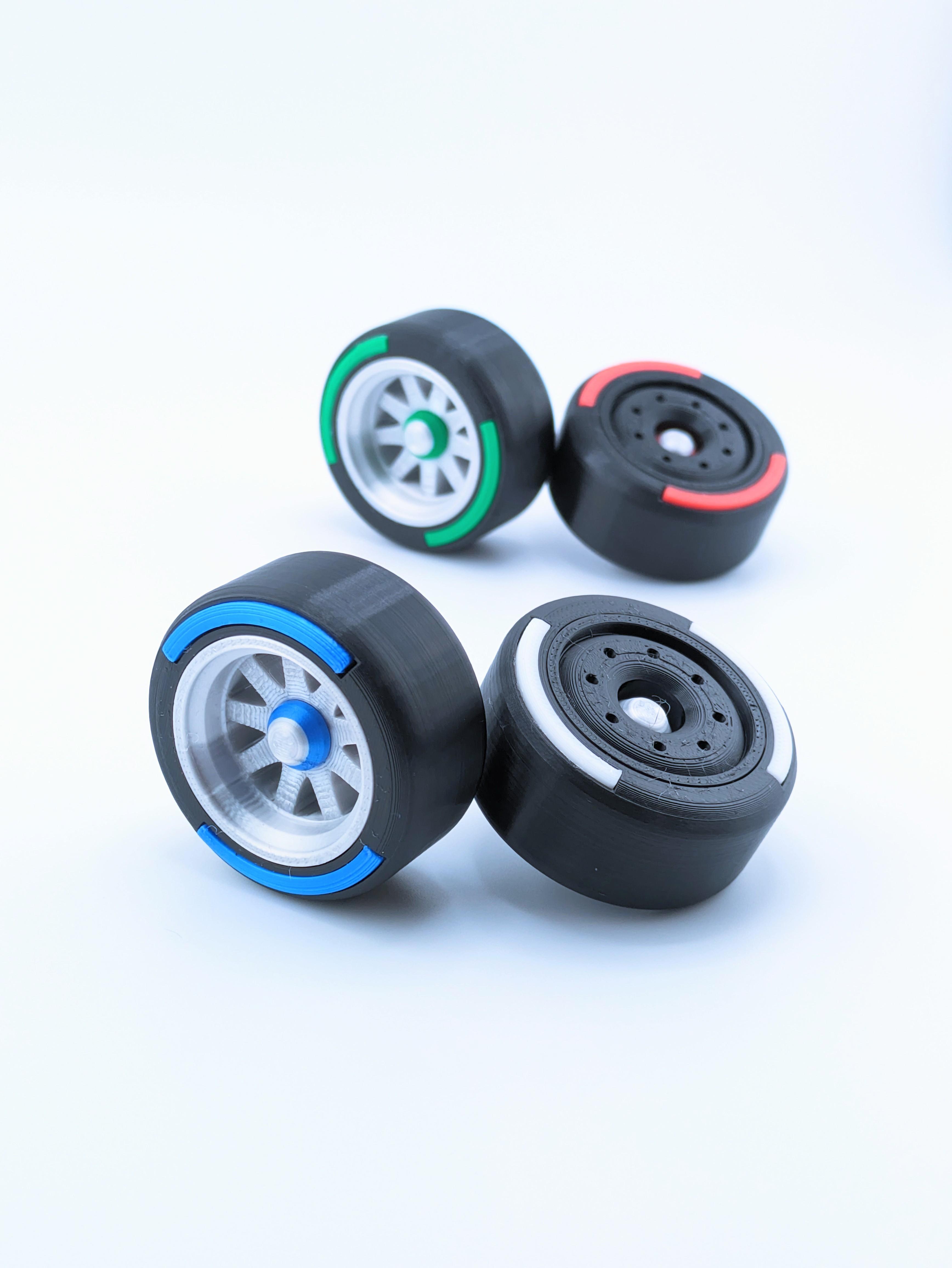 Spinning F1 Inspired Tire Keychain 3d model