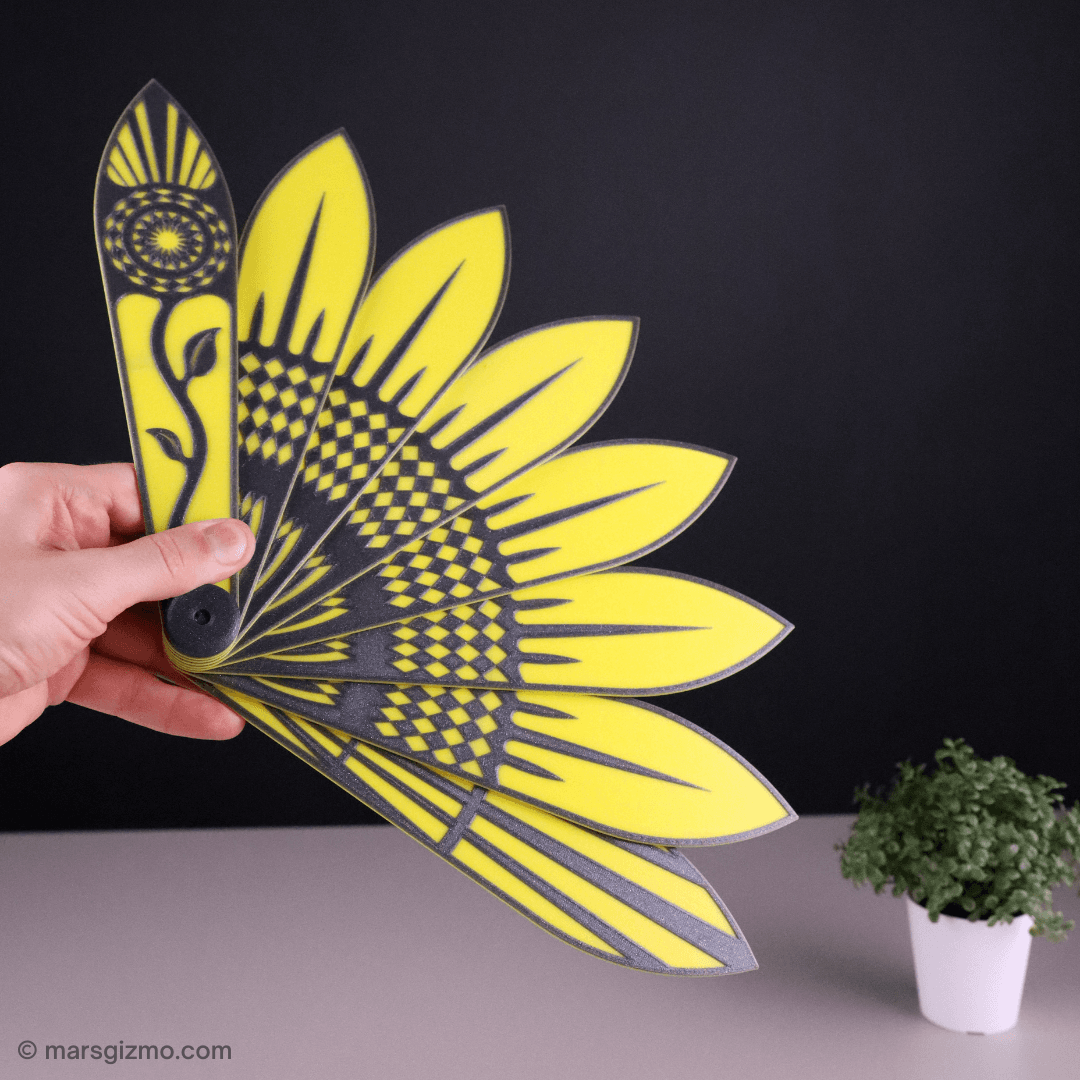 Sunflower Hand Fan (STL Format) | #pdo #summer | NoahMillerDesign - Check it in my video:
https://youtu.be/u1EImXgntHI

My website: https://www.marsgizmo.com - 3d model