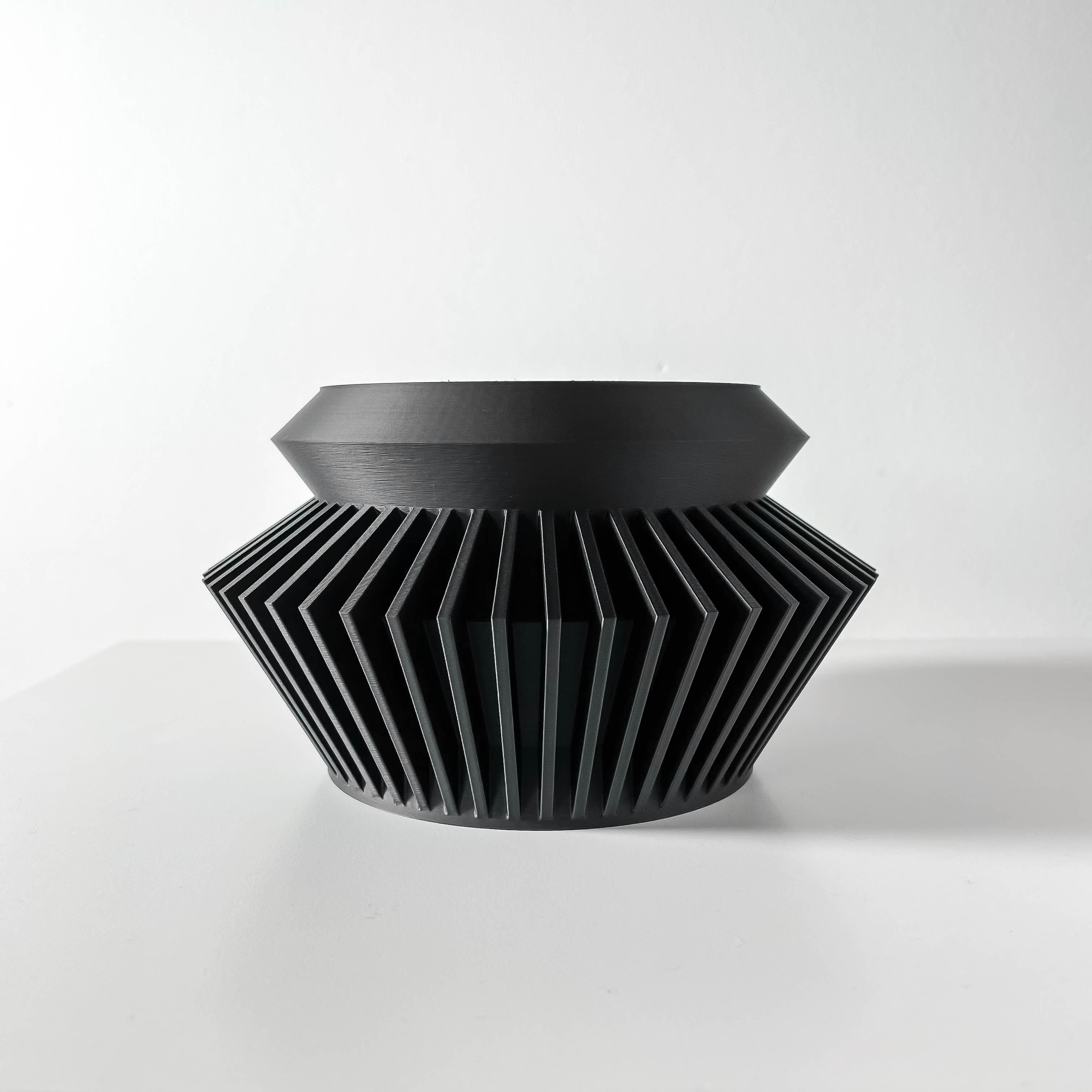 The Quano Planter Pot with Drainage Tray & Stand Included: Modern and Unique Home Decor for Plant 3d model