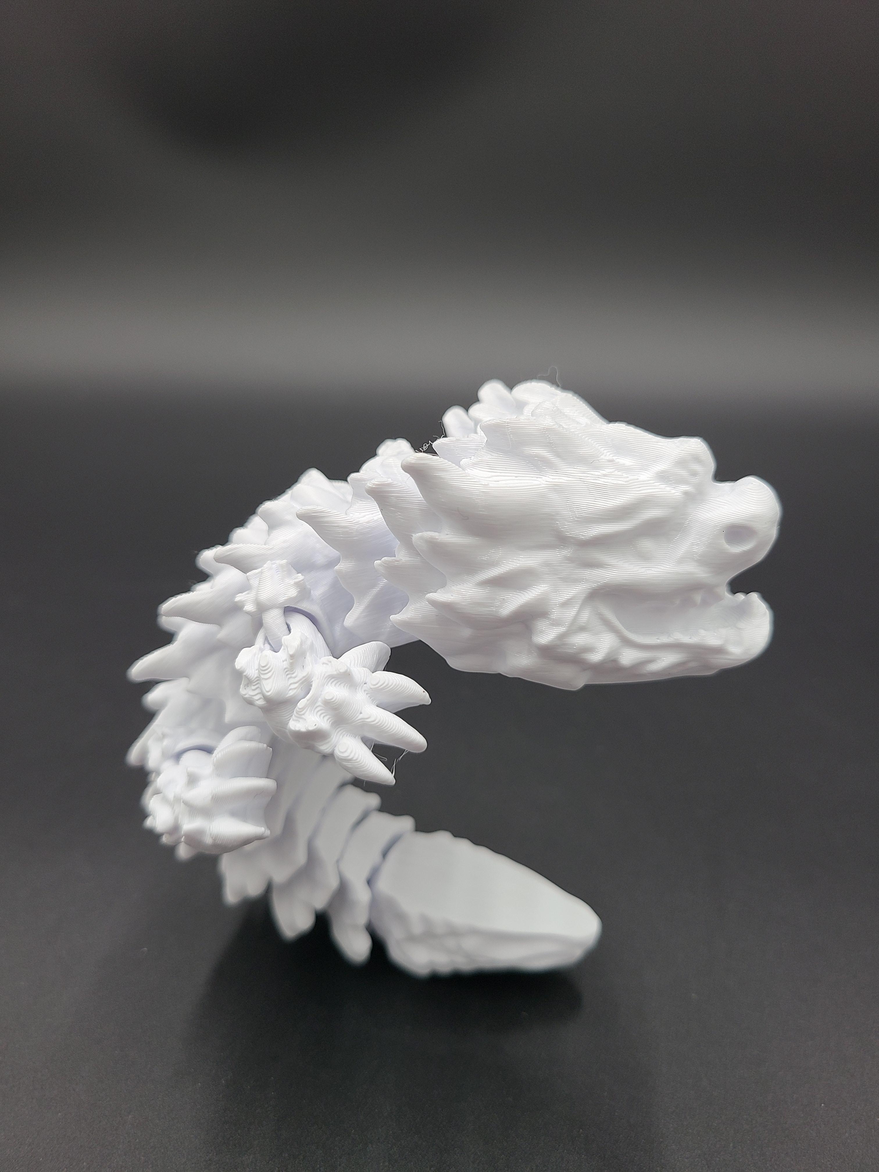 Snowfall, Winter Dragon Child - Articulated Dragon Snap-Flex Fidget (Medium Tightness Joints) 3d model