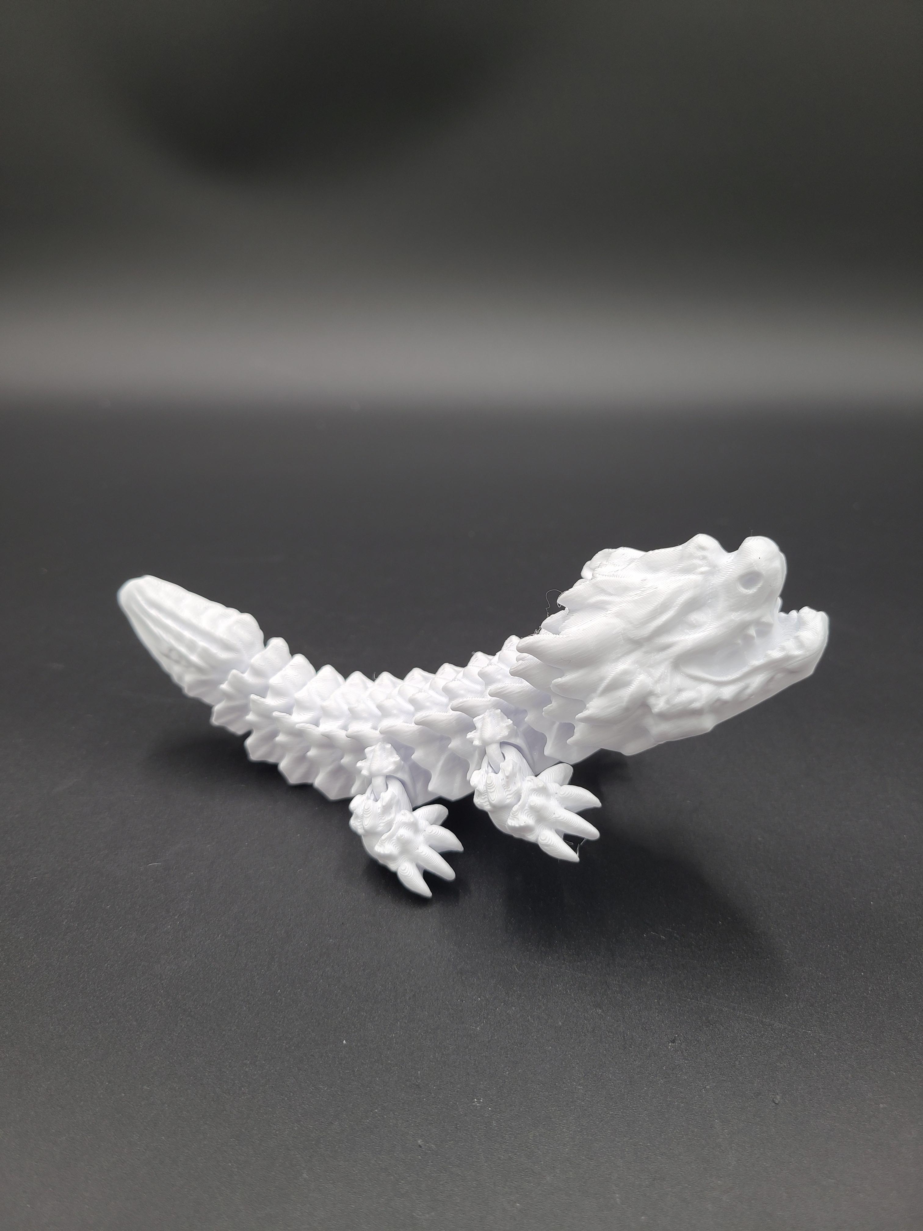 Snowfall, Winter Dragon Child - Articulated Dragon Snap-Flex Fidget (Medium Tightness Joints) 3d model