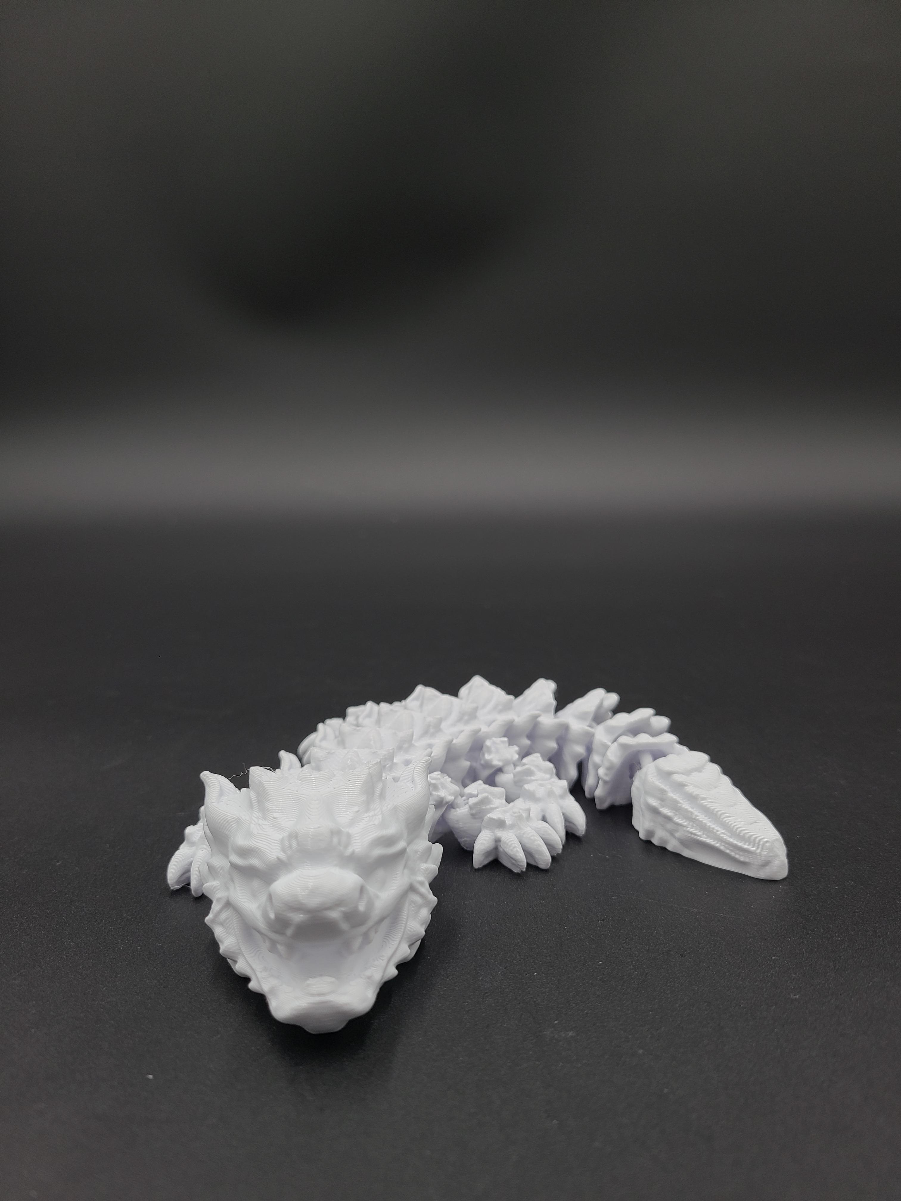 Snowfall, Winter Dragon Child - Articulated Dragon Snap-Flex Fidget (Medium Tightness Joints) 3d model