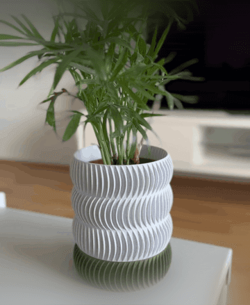 Swirly planter with a drip tray 3d model