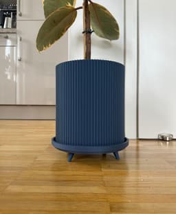Very happy with how it turned out. Printed on AnkerMake M5C with ERYONE Matte Navy Blue PLA filament. Scaled the 6.5" up to 110% to fit the plant I had in mind. Great design! 3d model