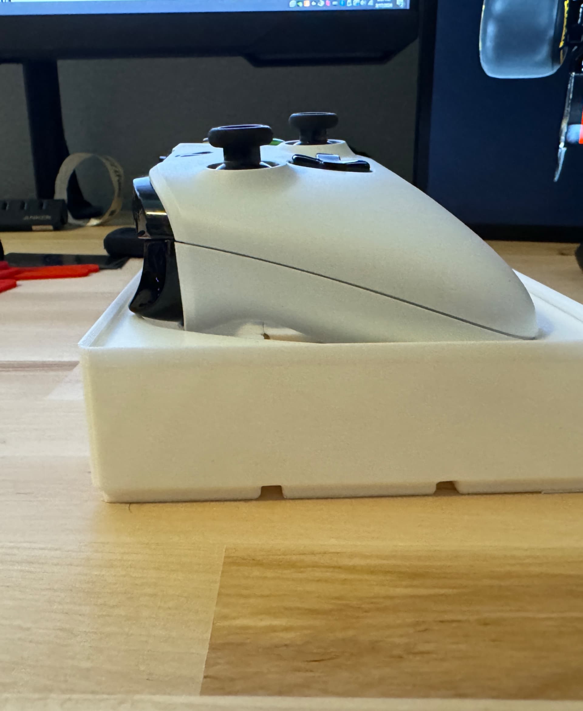 Bottom wall too thin, grid came right through. Broke off easily. Controller doesn’t even fit inside.