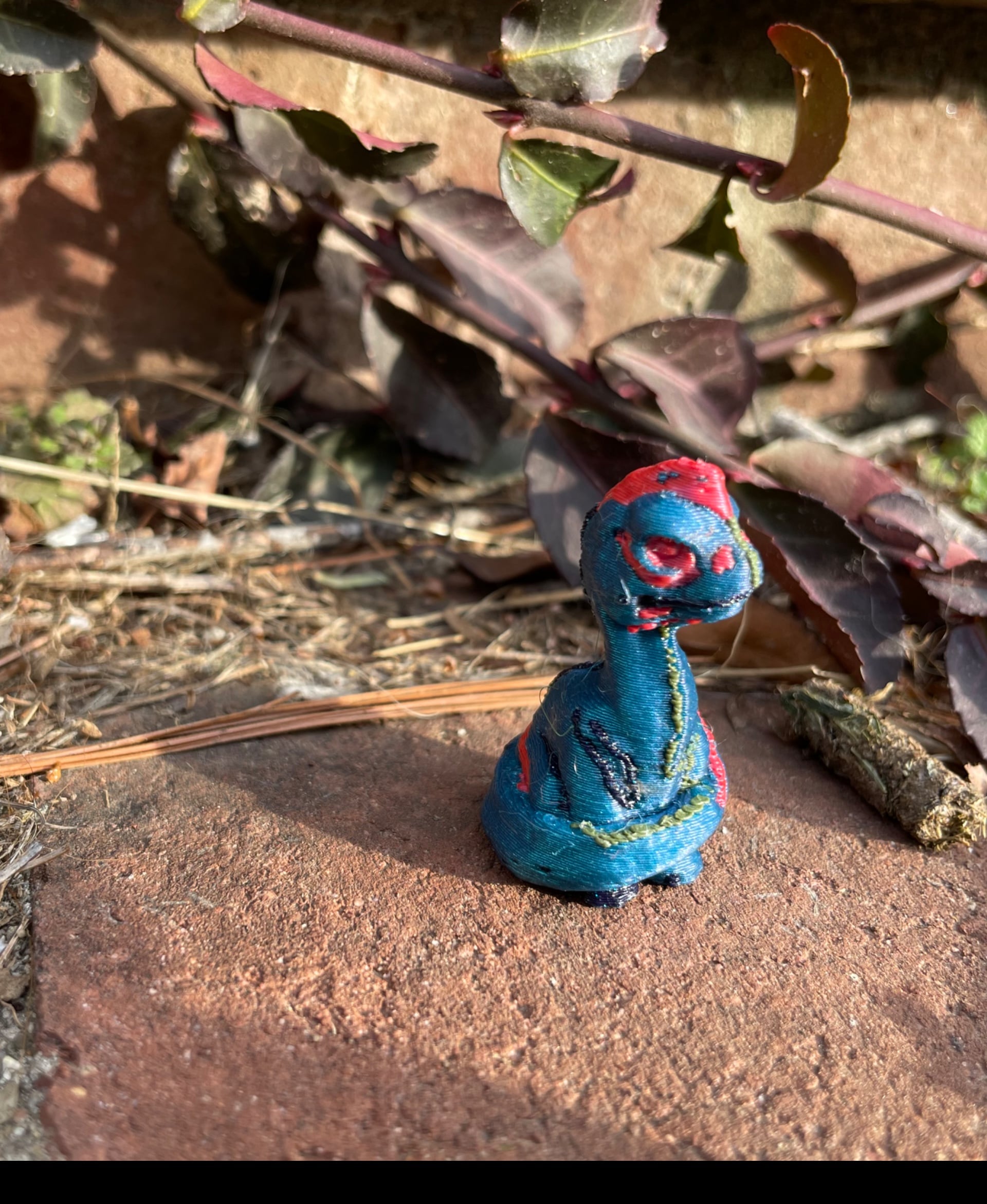 Baby Dino in multi-color.