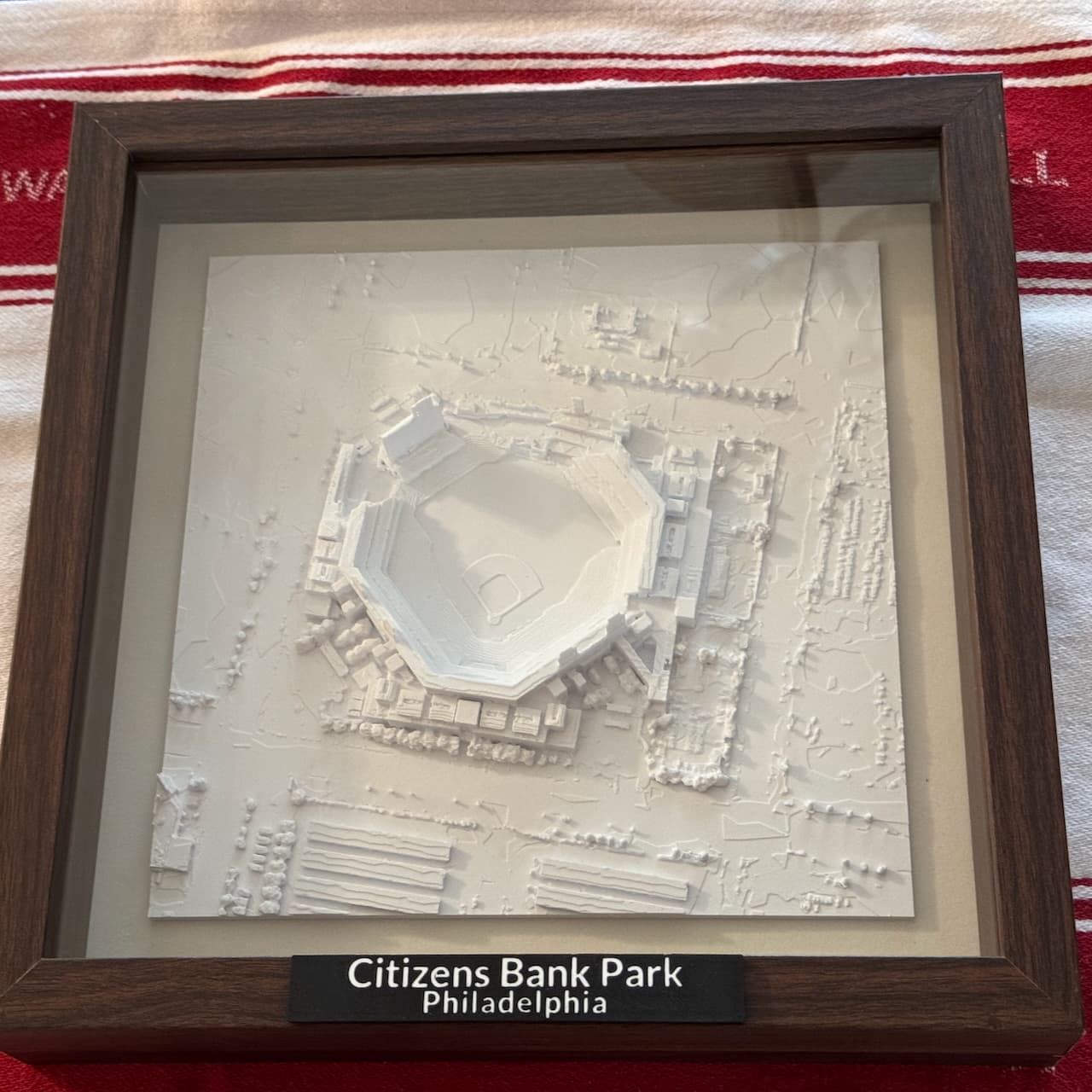 As printed to gift to a family member to hang in his man cave, this turned out great! The frame is the 11x11" shadow box from Americanflat (got it on Amazon), and the print is just hot-glued to the backer board inside the frame. I scaled to 230x230, and printed it in eSun Cold White PLA+. Love how it turned out!