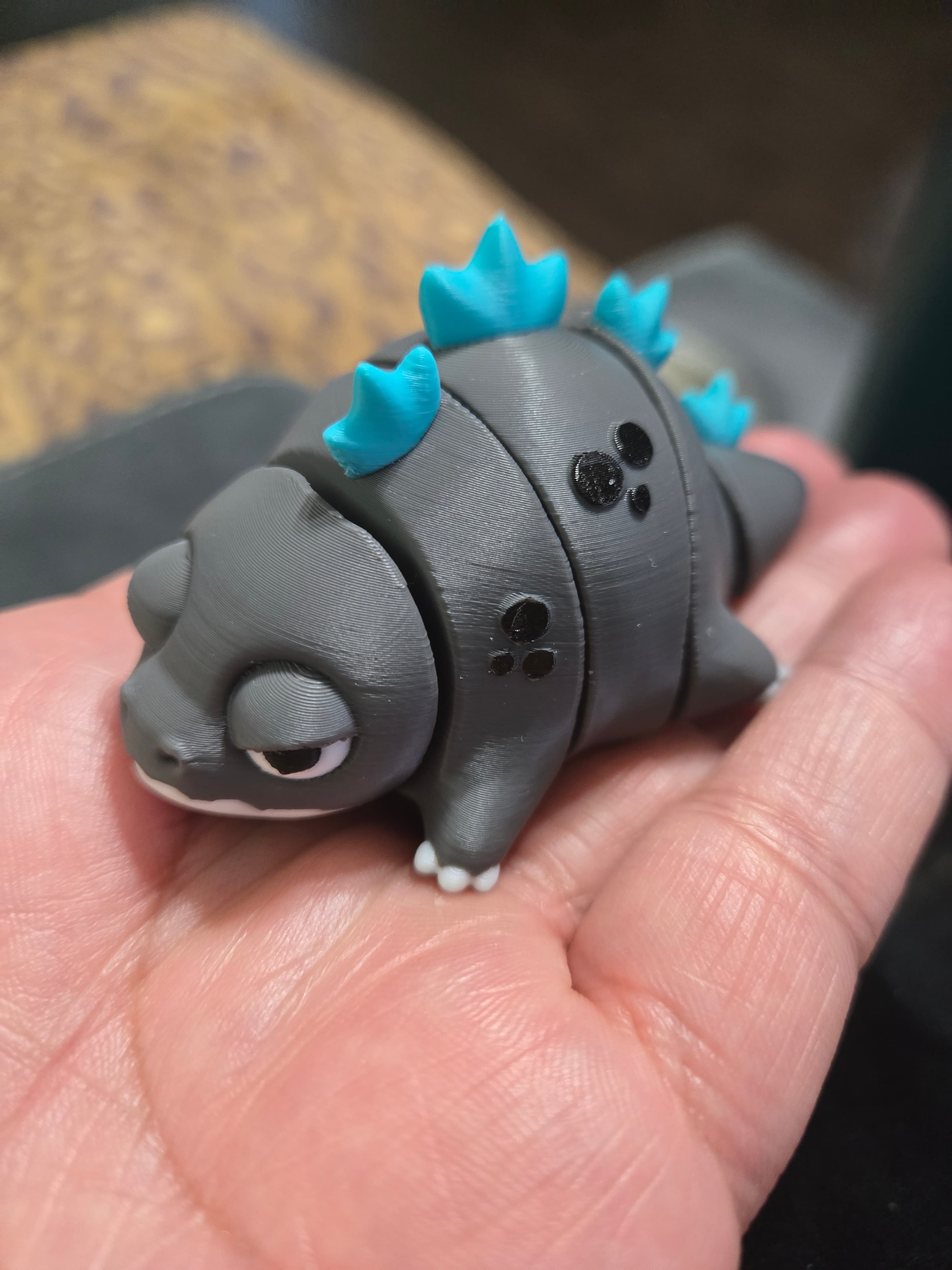 He is PERFECT! I love it so much. Great Print. I typically avoid printing models with a lot of color changes but he is worth the poop. 10/10 would print again...... Maybe with the pink spikes ;-)