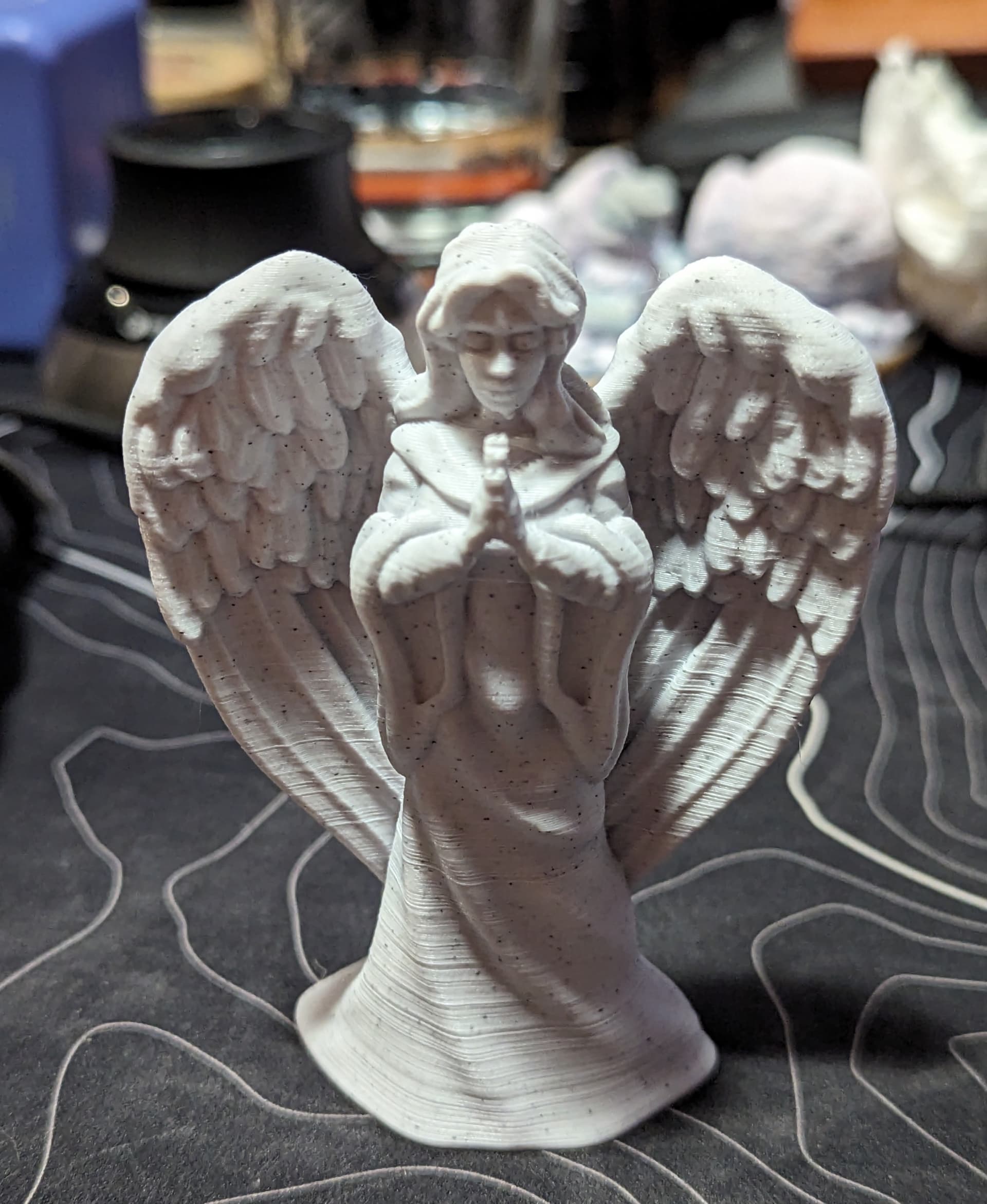 A little half scale angel from Polymaker Marble PLA.
I enabled the ‘Make overhangs printable’ option to print this with no supports. It’s only a little noticeable to help the chin print without supports.