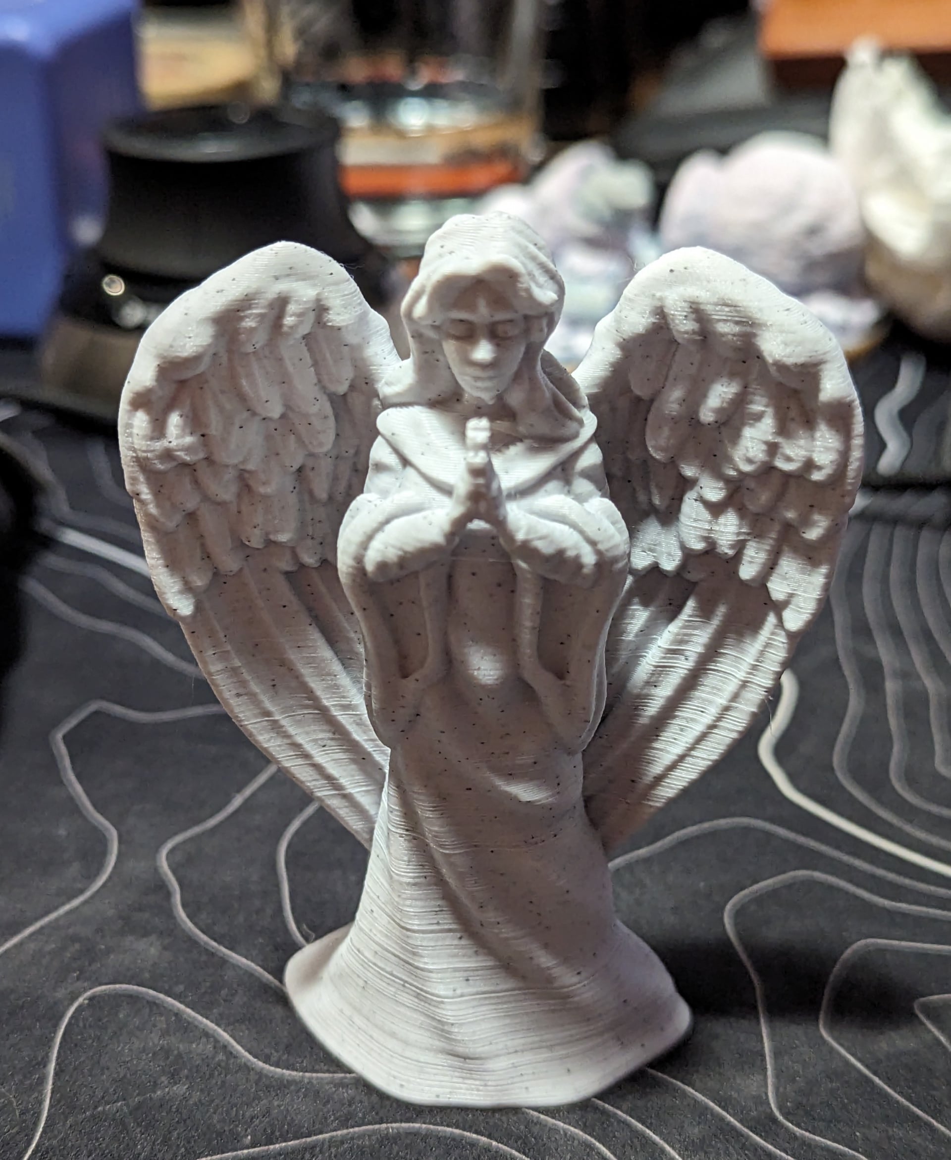 A little half scale angel from Polymaker Marble PLA.
I enabled the ‘Make overhangs printable’ option to print this with no supports. It’s only a little noticeable to help the chin print without supports.