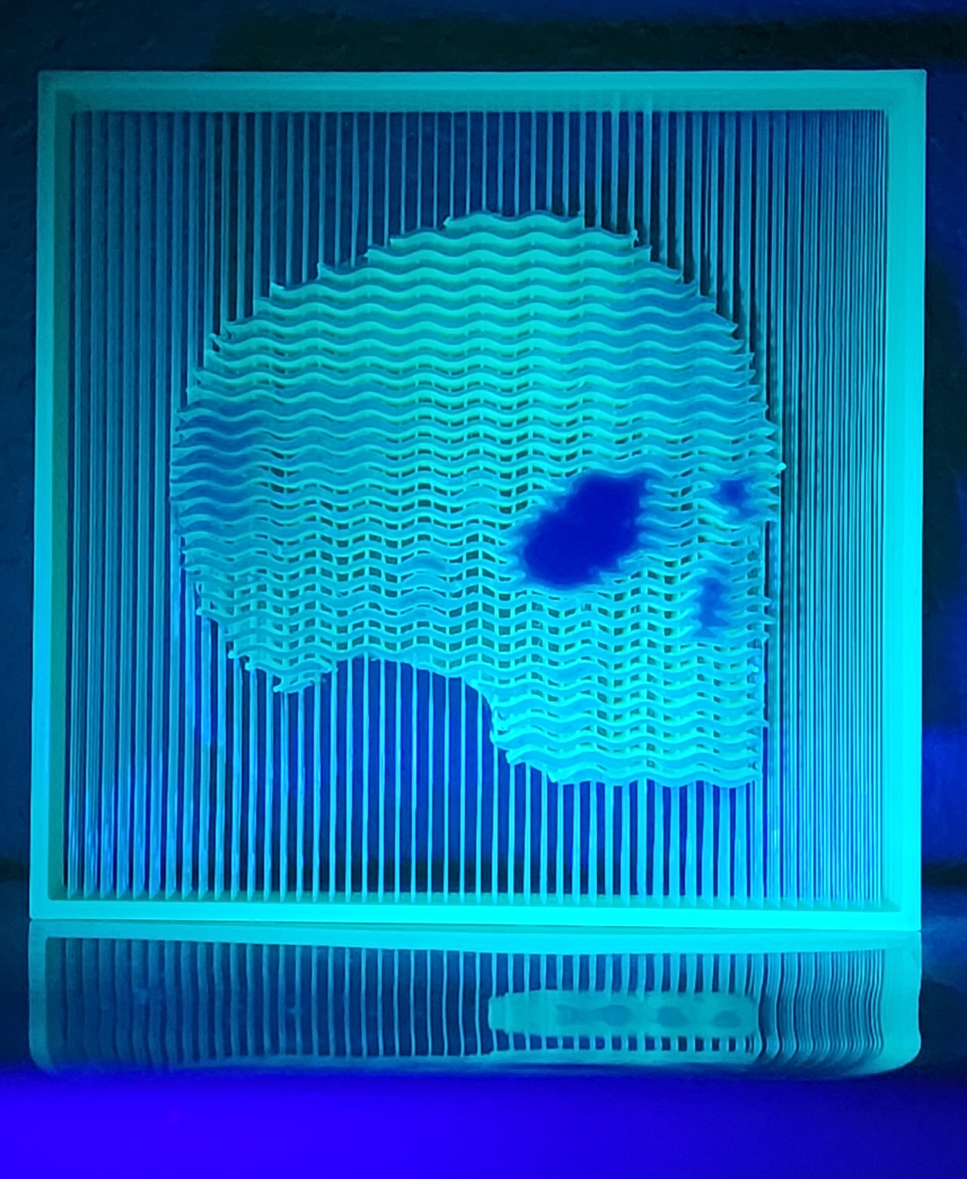 Florescent green under a black light! Blue top layer. First attempt, came out great! Thanks :)