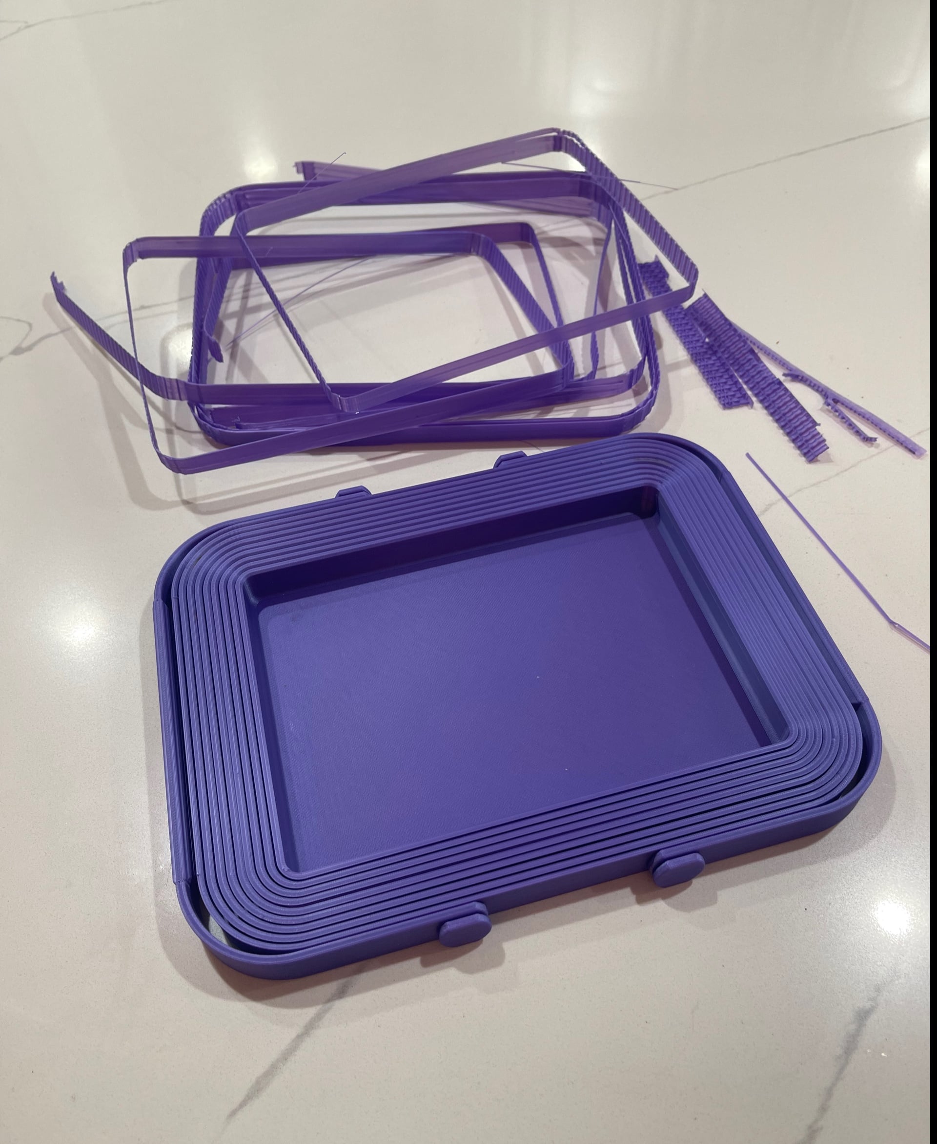 I printed this on my Prusa 3+ and it was my most trying print thus far. I tried with PETG but it clumped and crashed. I switched to PLA and readjusted the first layer to stick better and it worked. Mine said it recommended supports so that is what the bands are in the photo. They were easy to remove. It took a long time to print but I was glad I overcame the two crashed runs and got it to print. Loving the purple PLA.
