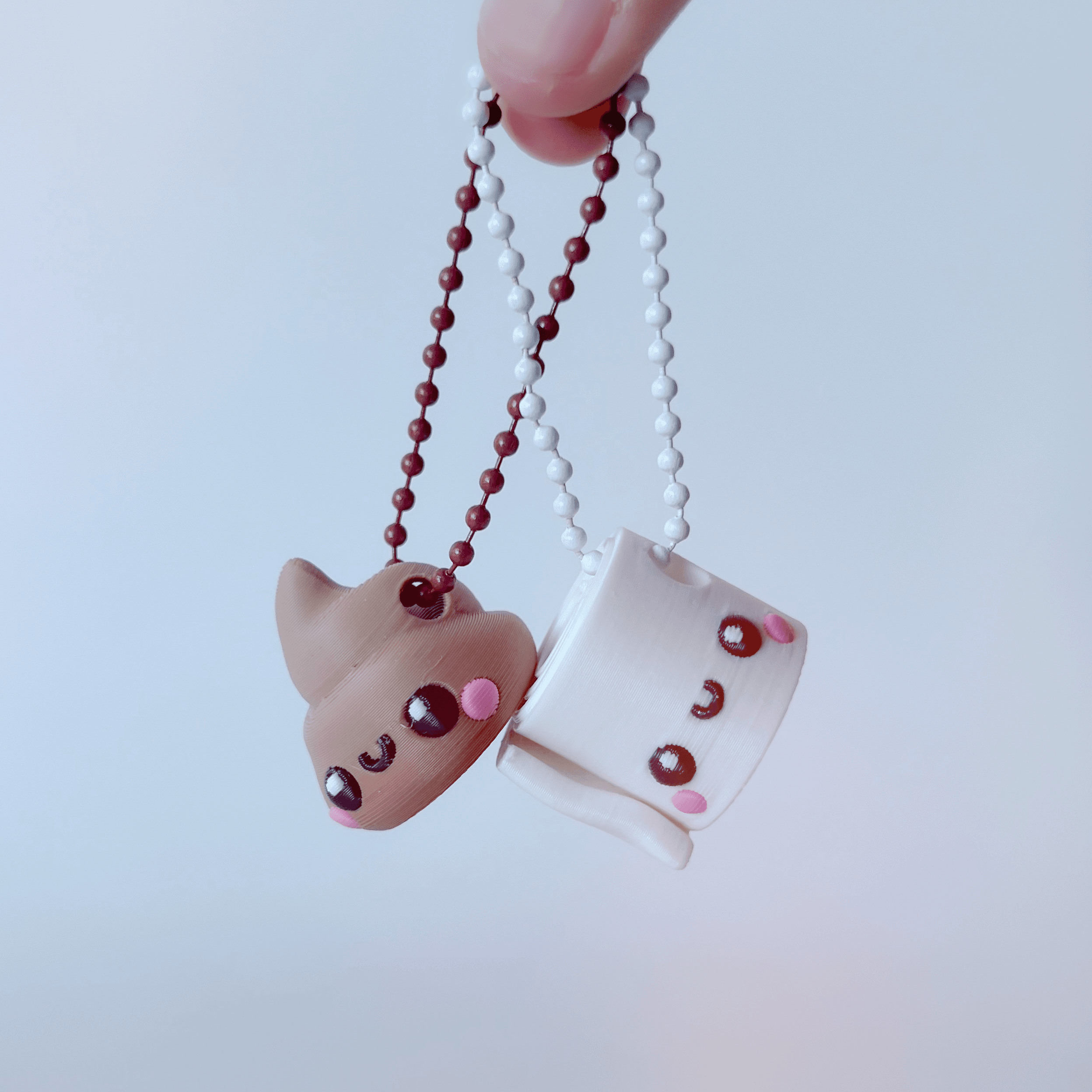 Poop and Toilet paper keychains 3d model