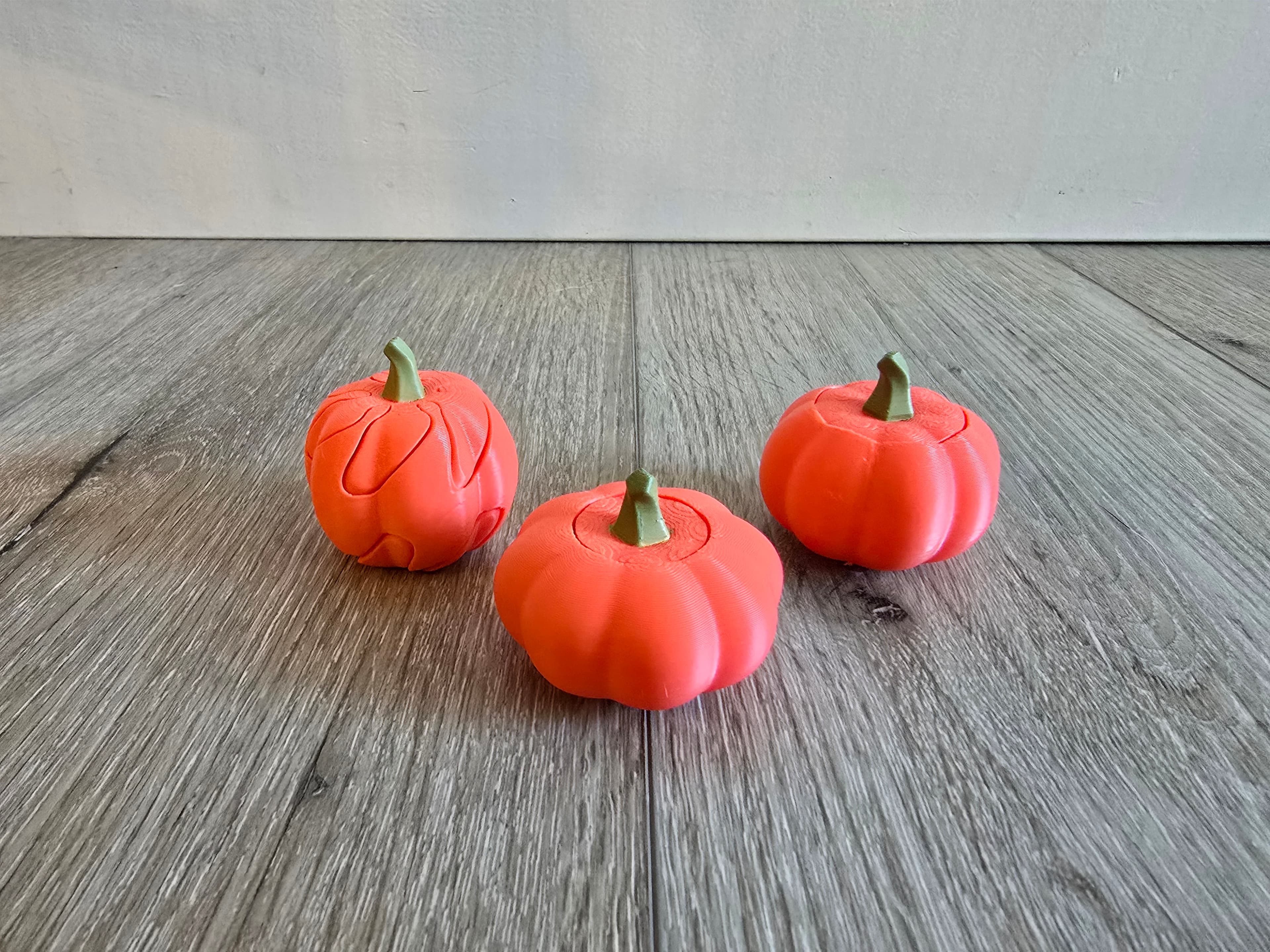Fall fidgets printed on Bambu Labs A1 printer with CookieCAD PLA in coral. I painted the stems. These are so fun! My husband especially loves the spinner with the pass-through a close second.