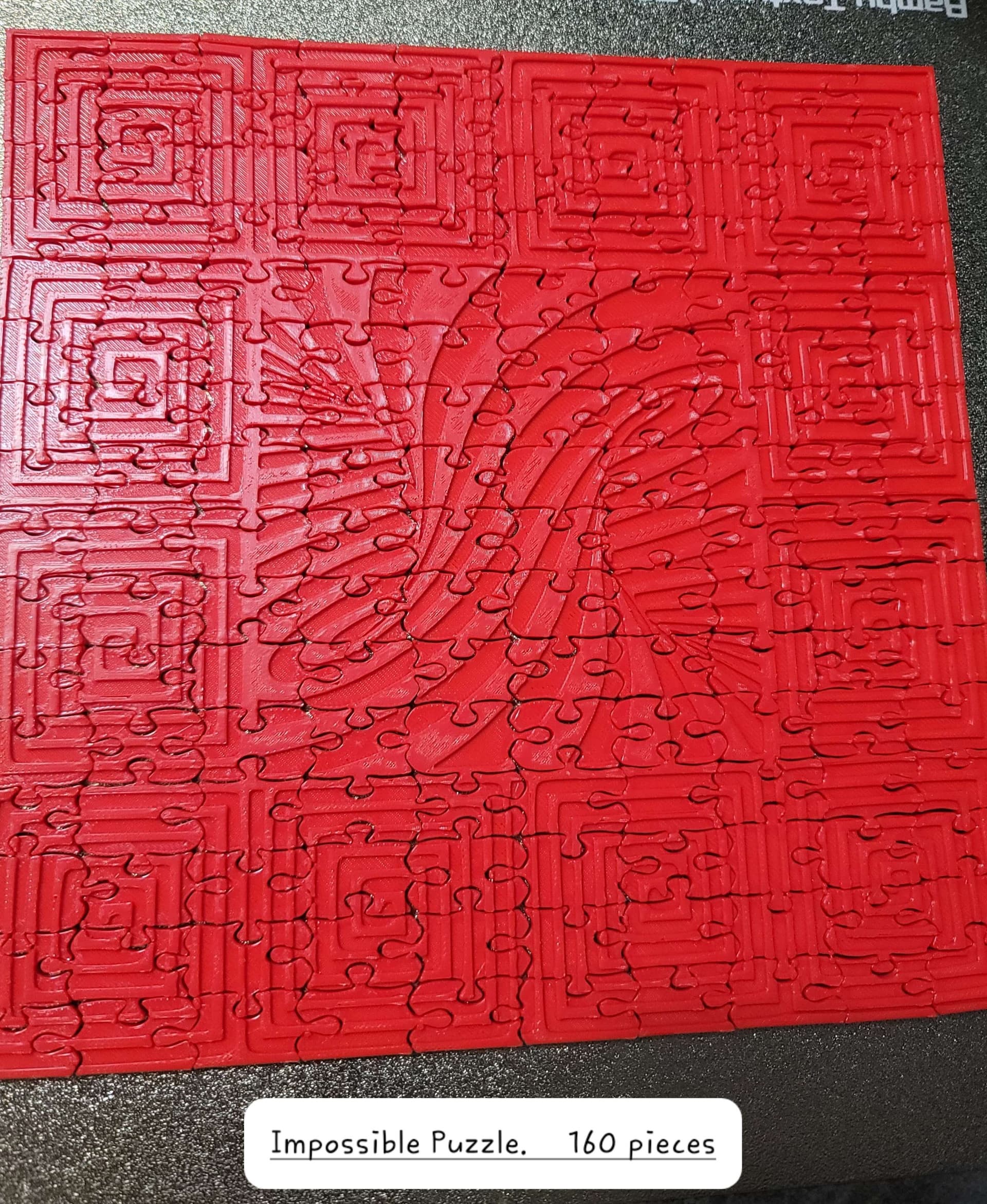 Make in Bambu basic PLA red on the P1S. I'm excited to gift this to my father who LOVES jigsaw puzzles. I specifically kept this one color to make it "impossible."