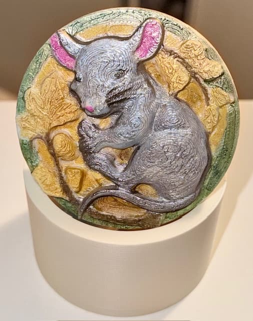 I tried to paint it like he is sleeping in a field of wheat...not sure how great THAT turned out! But, the print was perfect, the lid fits the box snugly.