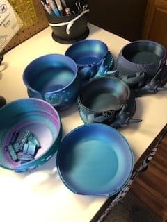 I've tried multiple different yarn bowl patterns and have struggled with the swirl overhang. Drives me crazy. I've wasted tons of filament (See photo of failed attempts. And that's not all of them). I finally got this dragon yarn bowl to work after manually adding more tree supports. I use Prusaslicer on an Ankermake printer. I watched a few Youtube videos on how to add extra supports to the swirl. Then went into Prusa and changed the support style to Organic (aka Tree); changed the Top Contact Z Distance to 0.2; and the Branch Diameter to 5. Some of the issues I had were that the tree supports would fall over halfway through building them, but before the reached the height where they would do any good. Increasing the diameter of them to 5 seemed to help. The supports will be hard to get off of the swirl. You'll need a clipper. I broke a swirl off one because I was in too much of a rush to break off the supports. I noticed a few thin spots on the bottom of the bowl around the edges. I'm not sure if that's something I did or if the designer can add a few more layers of filament to the design (Sorry, I'm new to 3D printing and still learning all these things). Love the finished product and I'm glad I found this design.