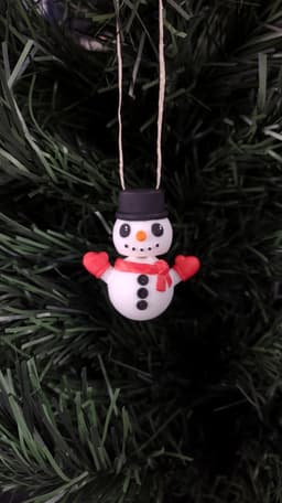 Snowman Fidget with Ribbon Hole 3d model