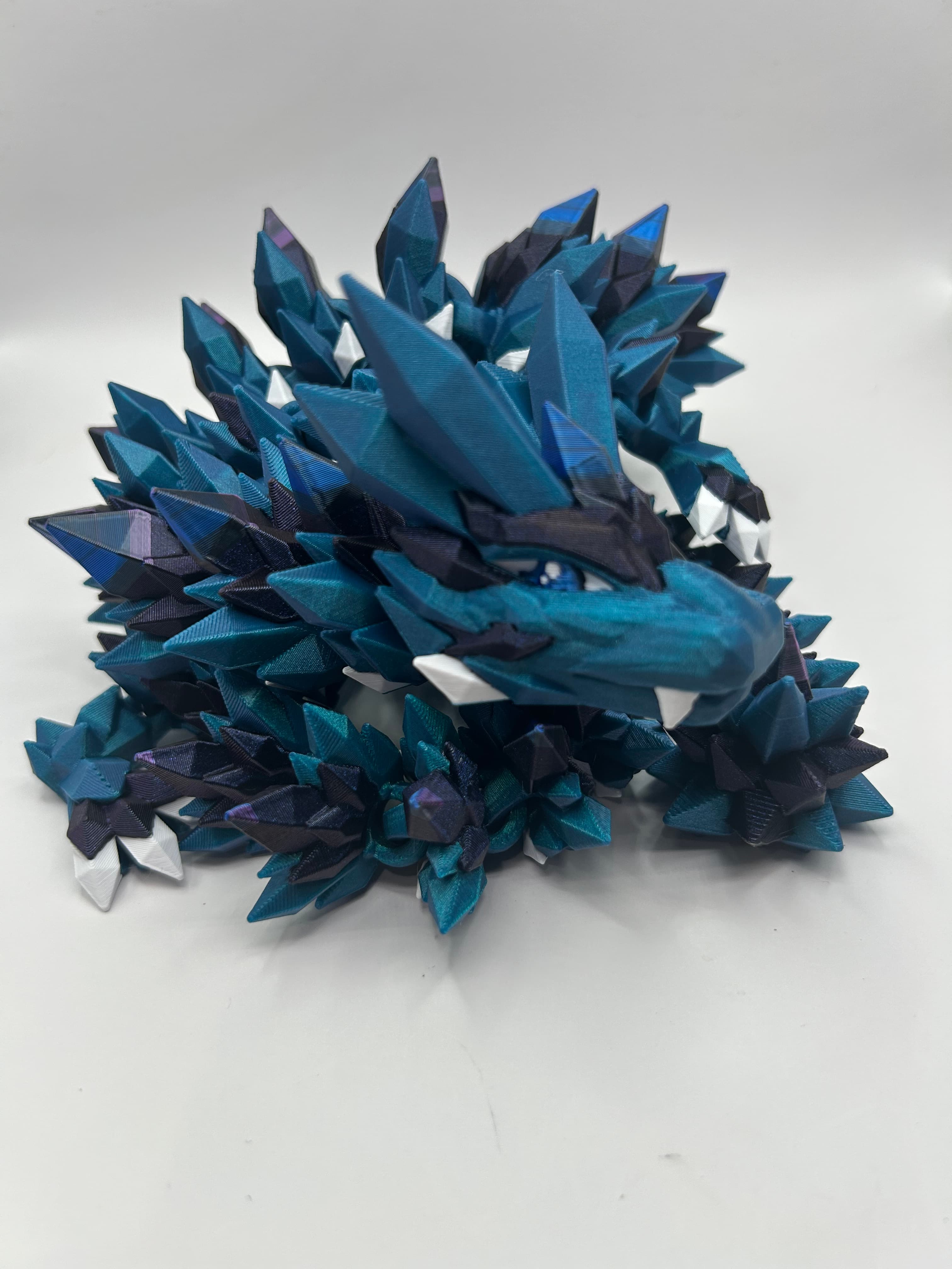 Used Polymaker Neptune, Lovoon Galaxy blue/purple, eSun White pla and Chitu Conjure Black/purple/blue.